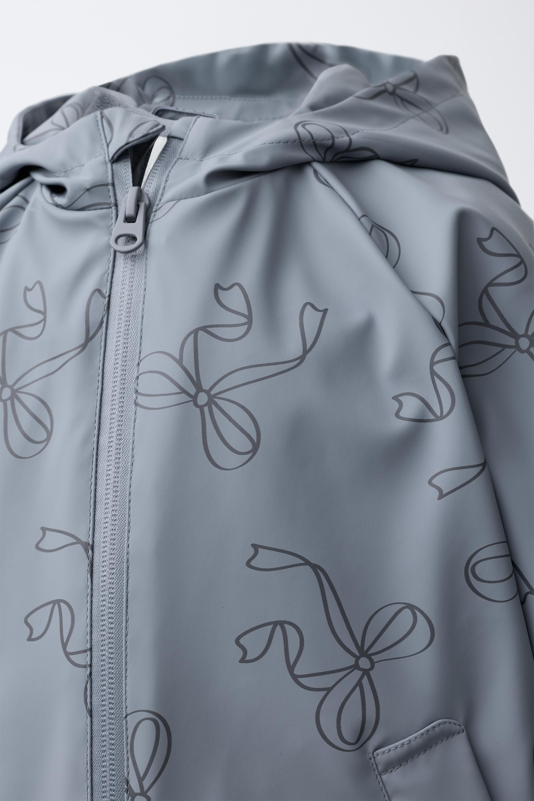 WATER RESISTANT PRINTED RUBBERIZED RAINCOAT