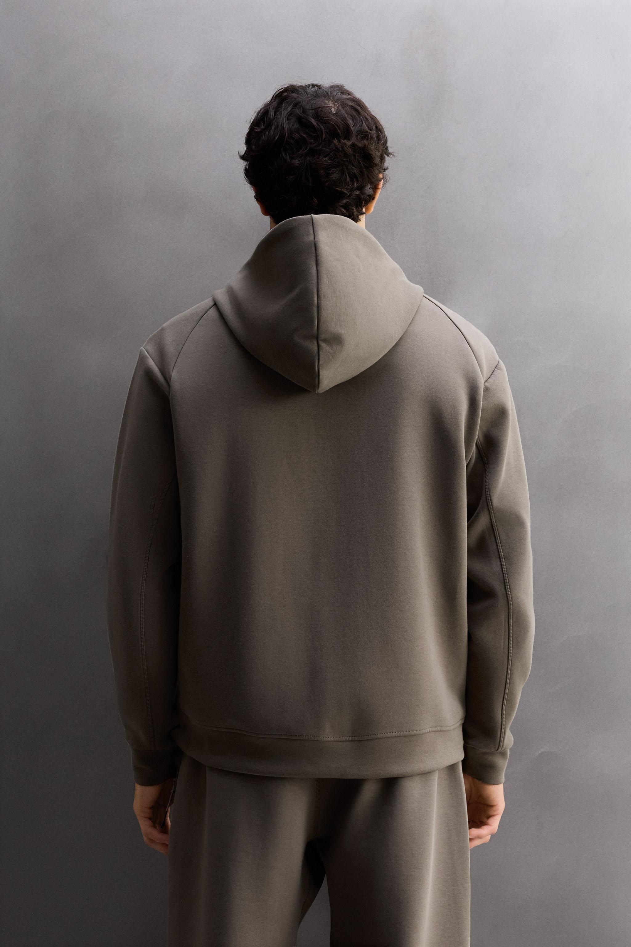 TECHNICAL ZIP-UP HOODIE