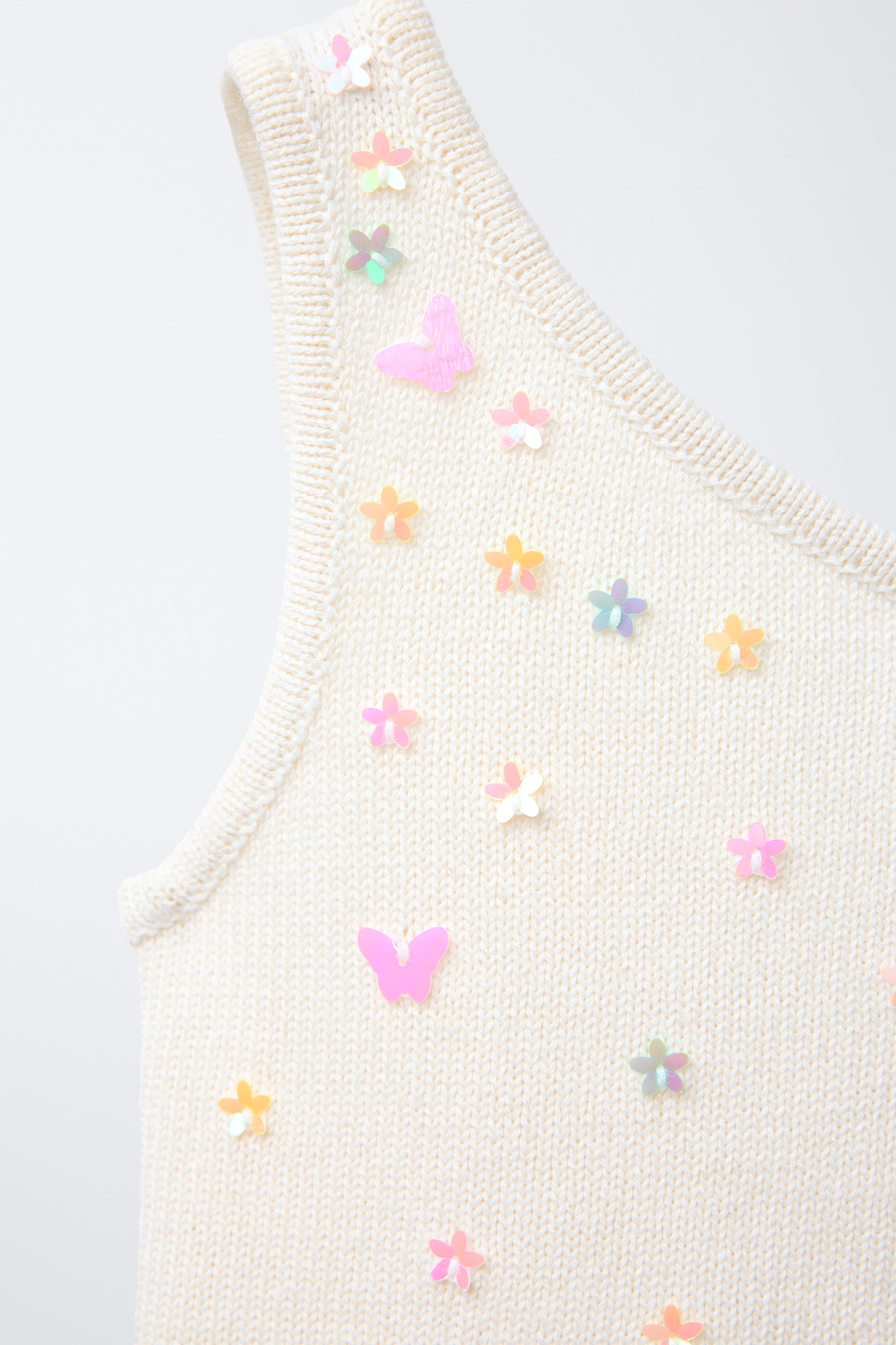 ASYMMETRIC BEADED KNIT TOP