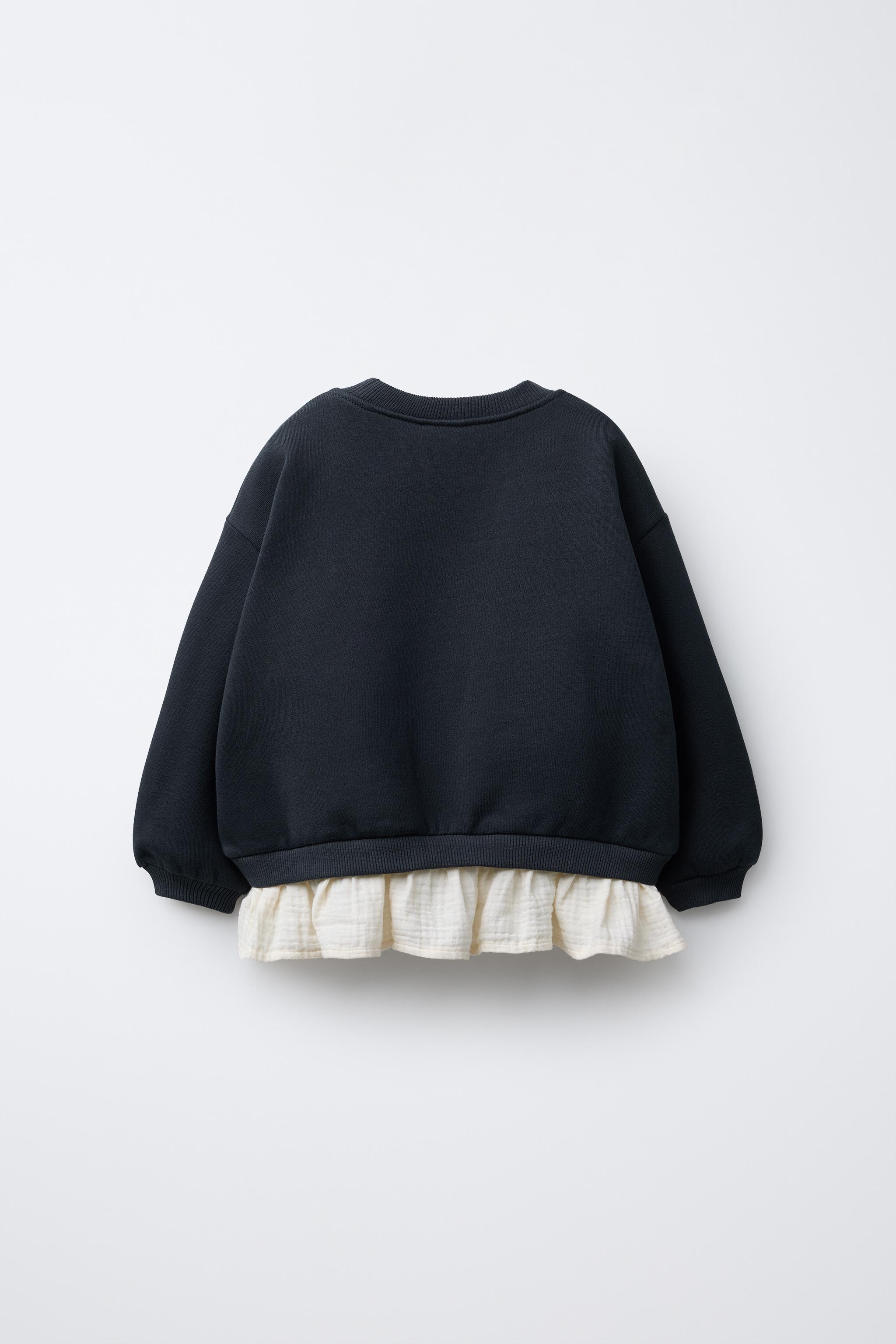 COMBINATION SWEATSHIRT WITH FLORAL APPLIQUÉ