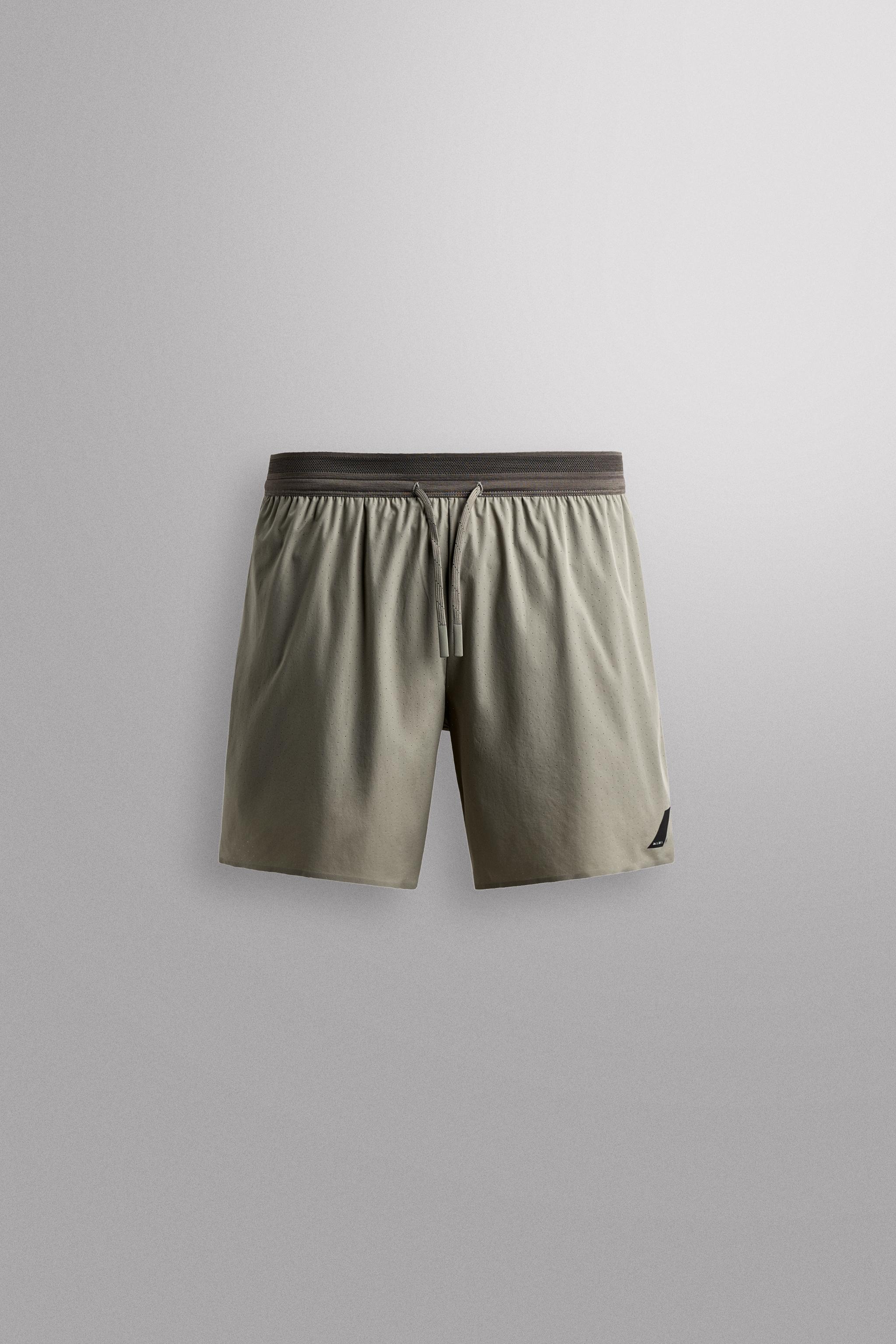 LIGHTWEIGHT PERFORATED SHORTS