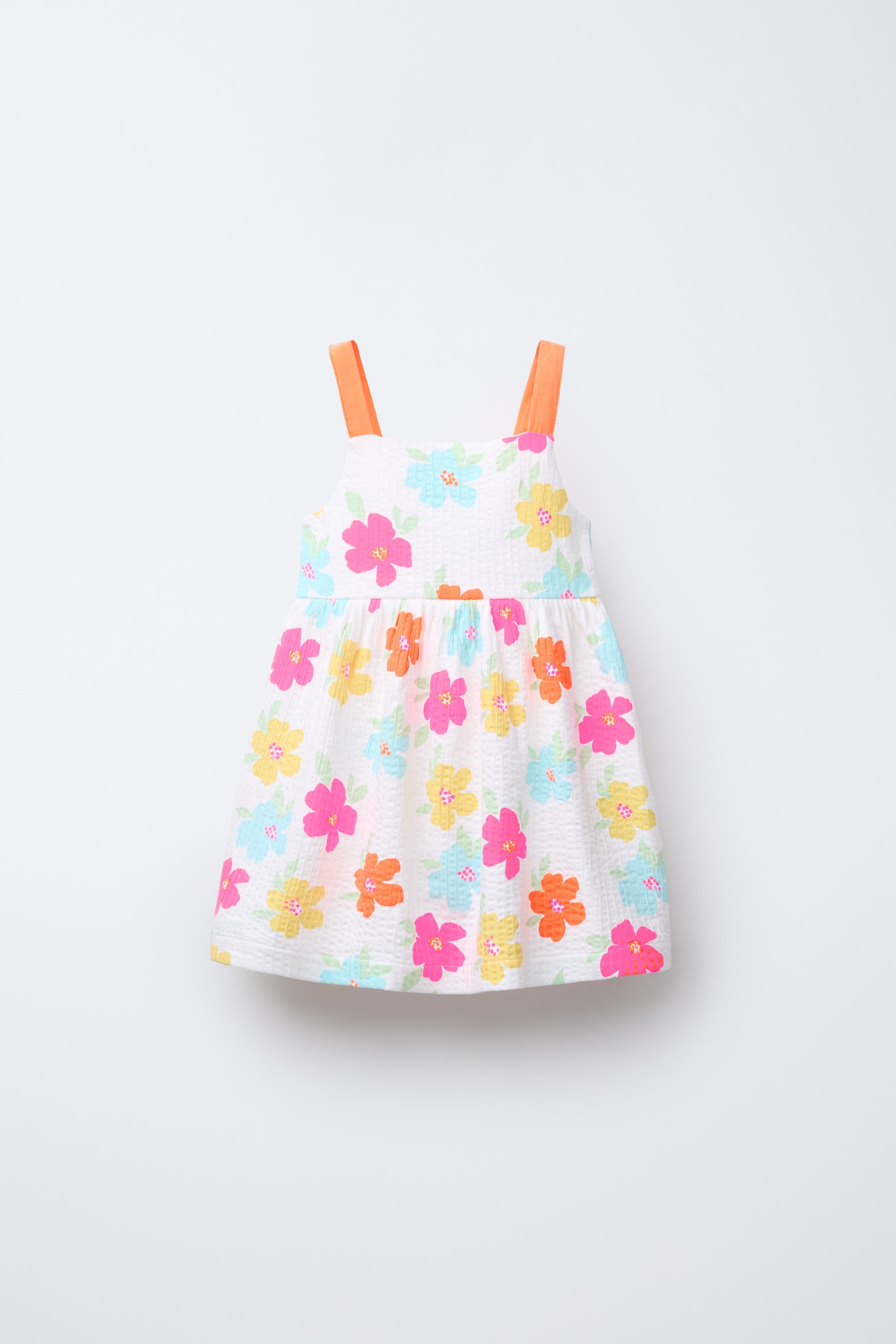 TEXTURED PRINTED BOW DRESS