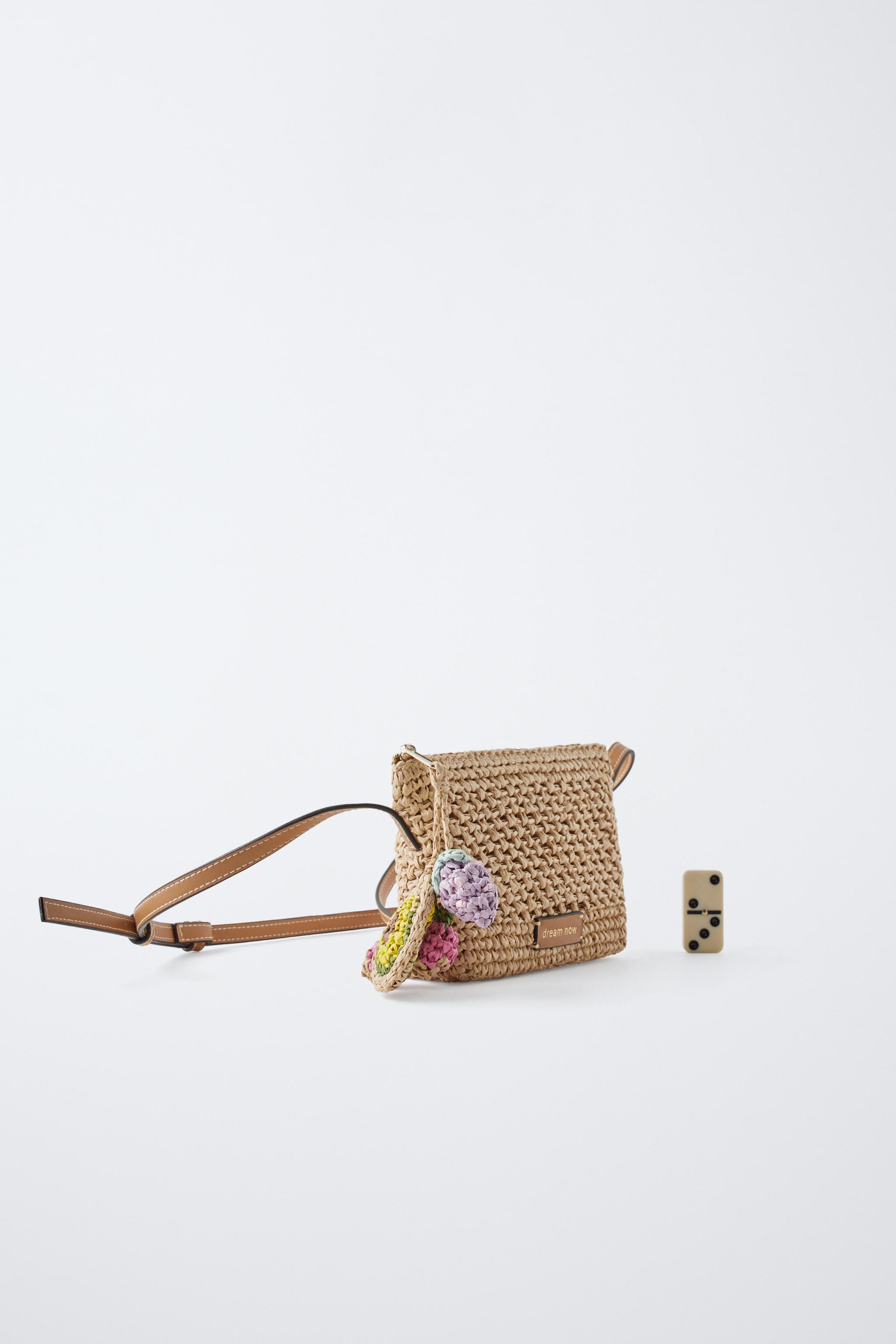 RAFFIA EFFECT CHARM CROSSBODY BAG