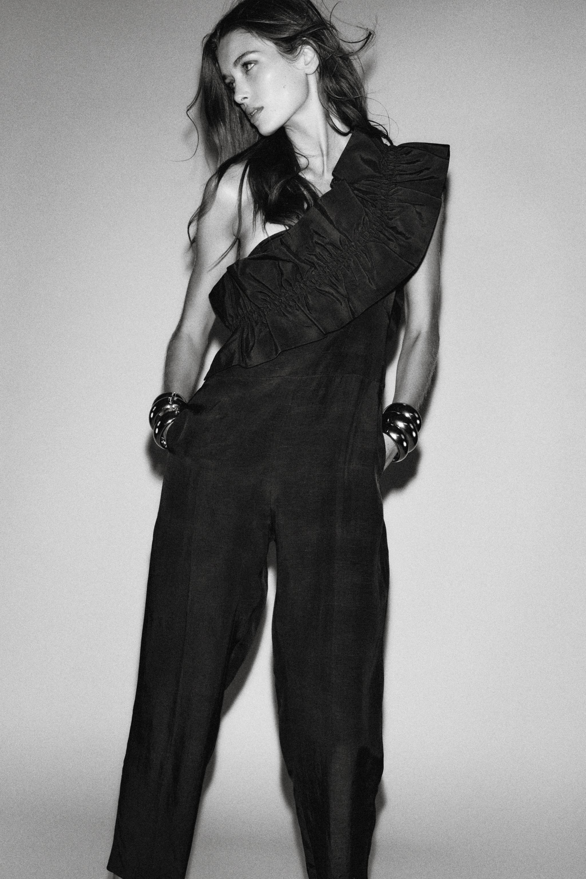 ASYMMETRIC RUFFLE JUMPSUIT