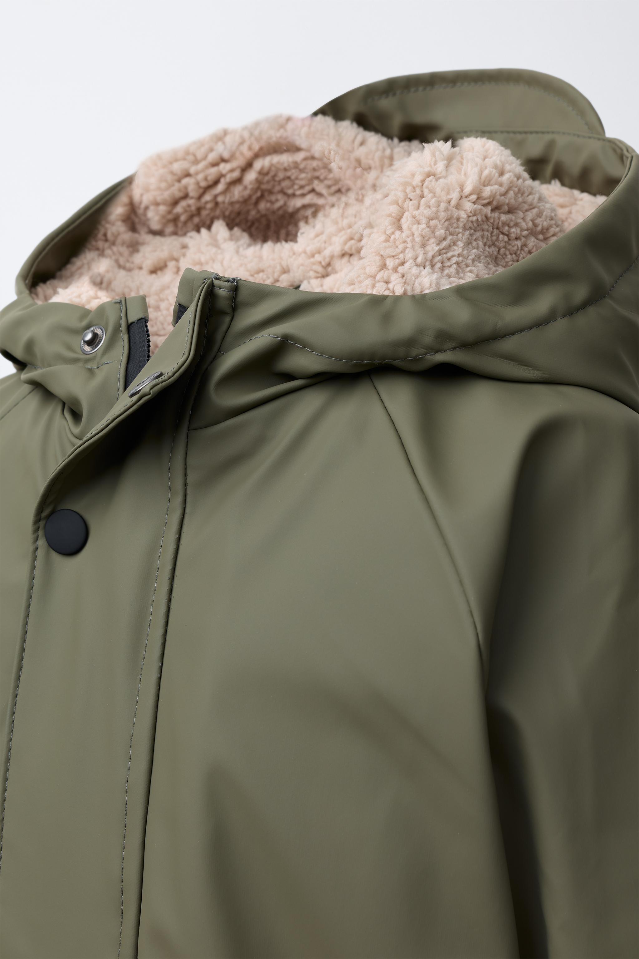 WATER REPELLENT FAUX SHEARLING COATED JACKET