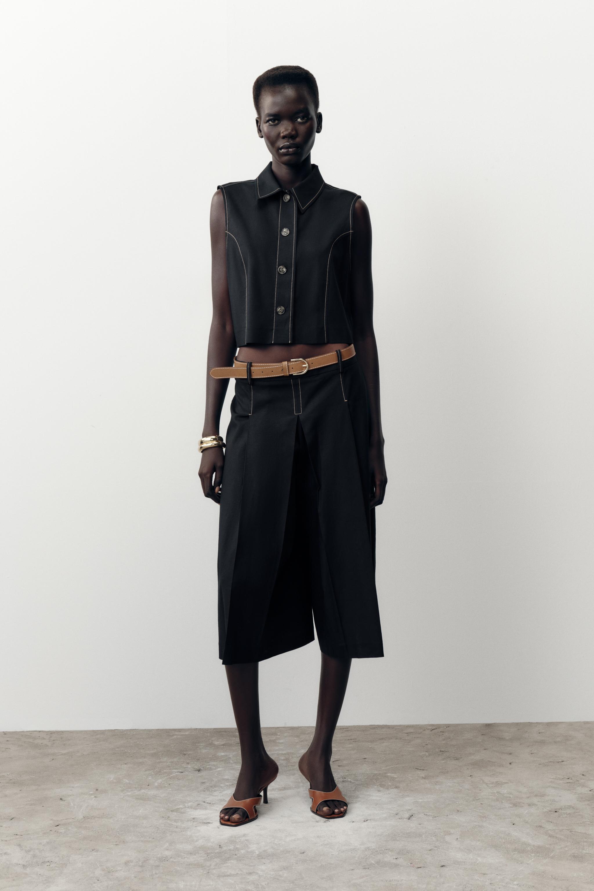 BELTED LONG PLEATED SHORTS