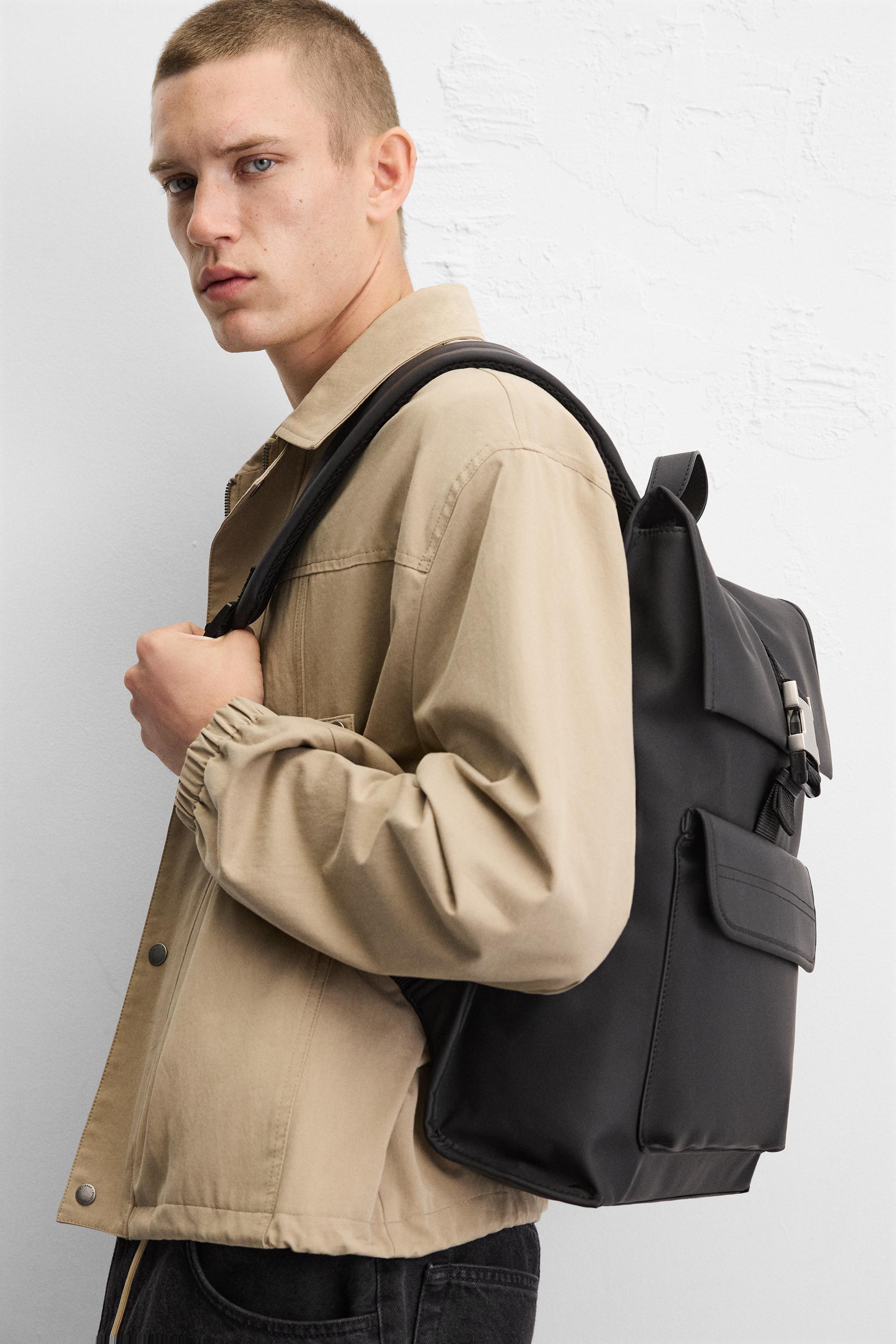 RUBBERIZED FLAP BACKPACK