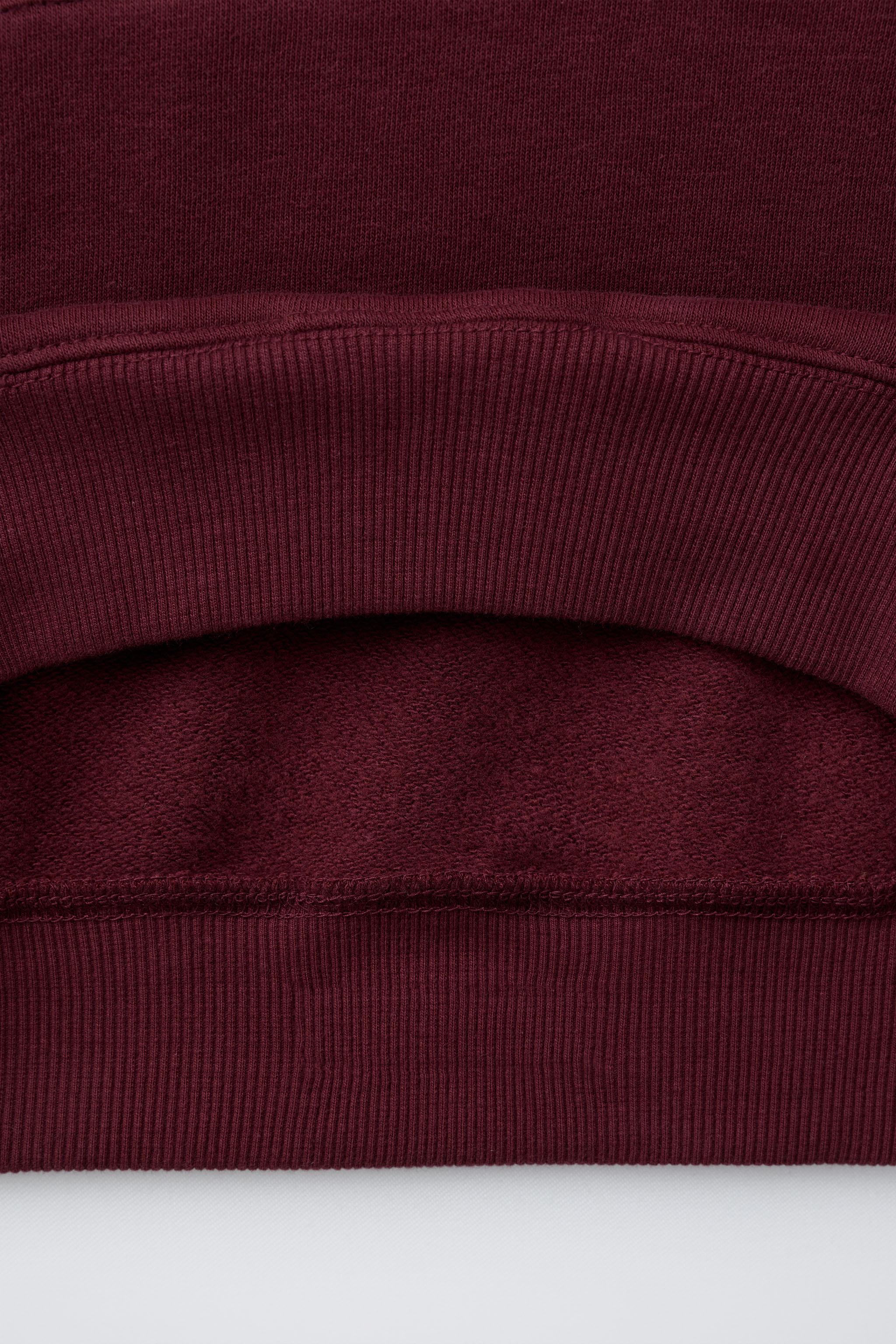 FLOCKED TEXT SWEATSHIRT