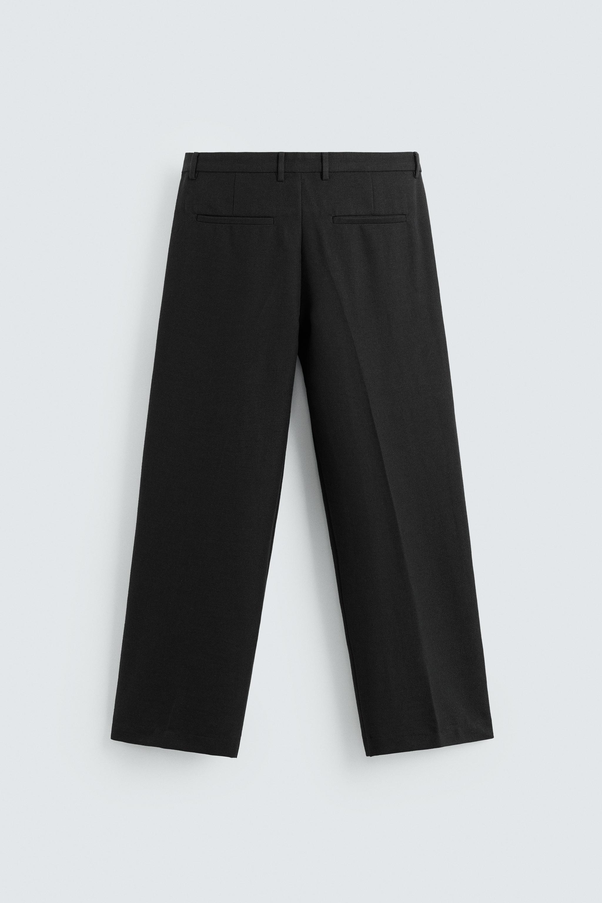 PLEATED RELAXED FIT PANTS