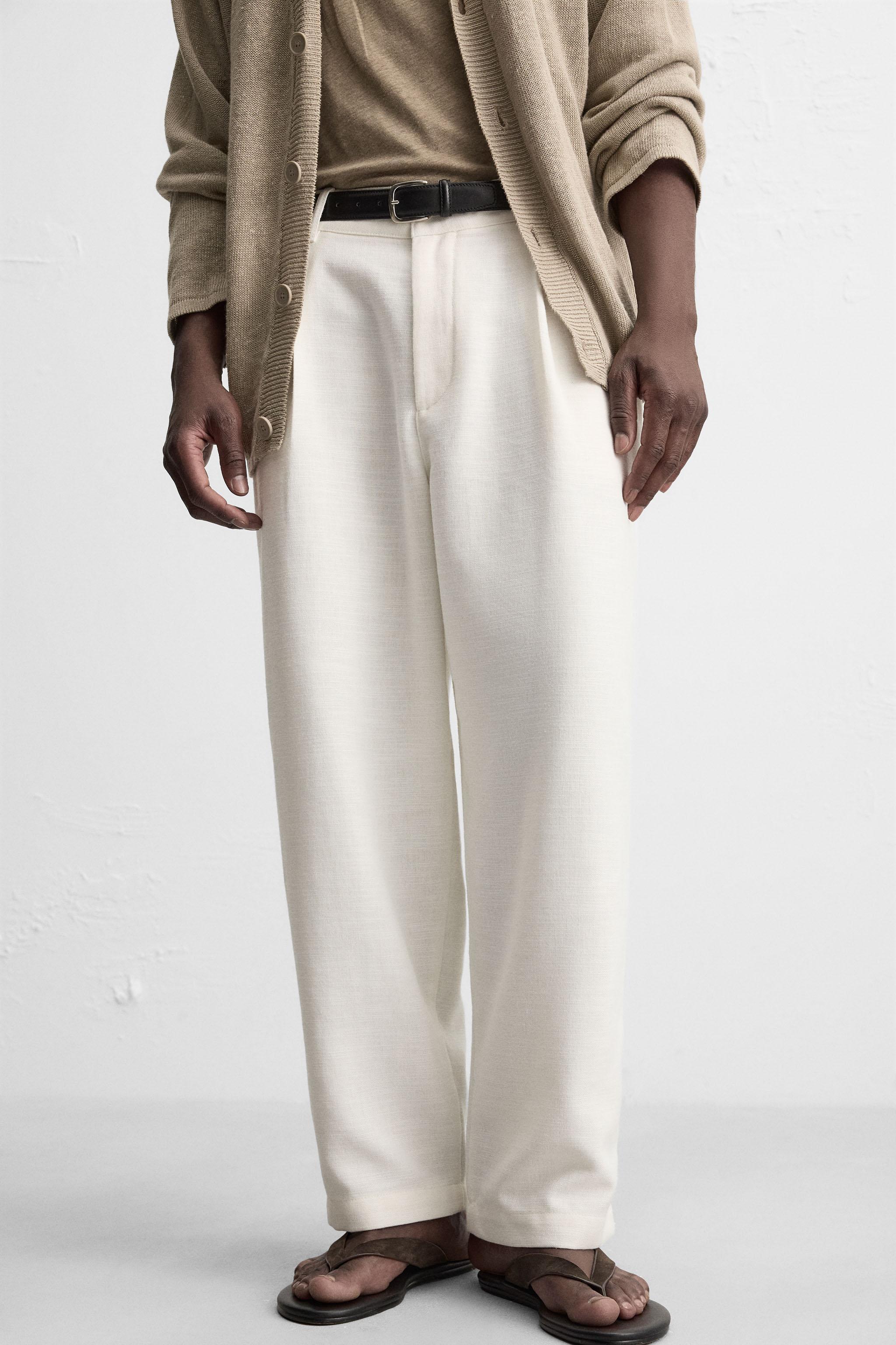 PLEATED RELAXED FIT PANTS