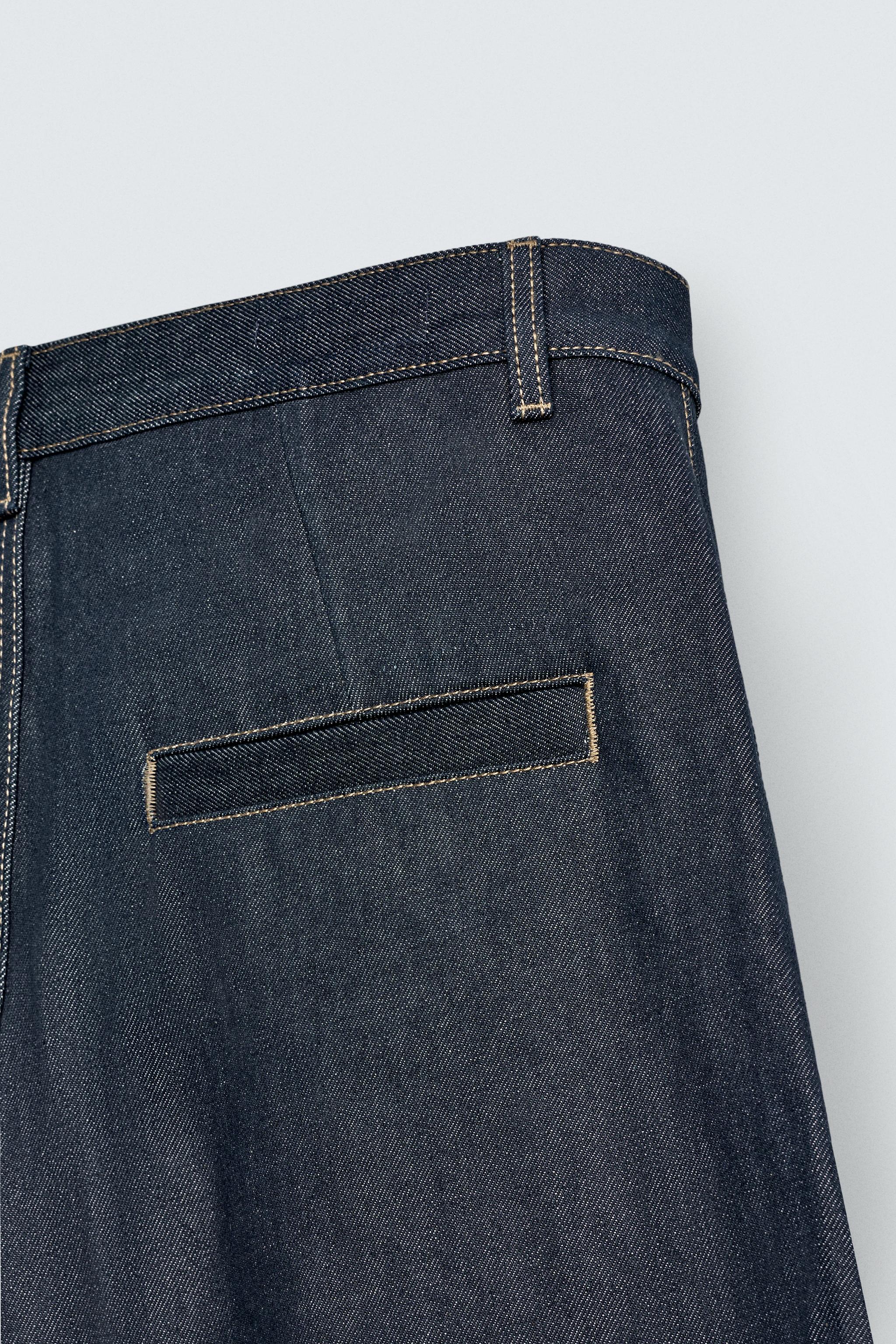 RELAXED FIT PLEATED DENIM SHORTS