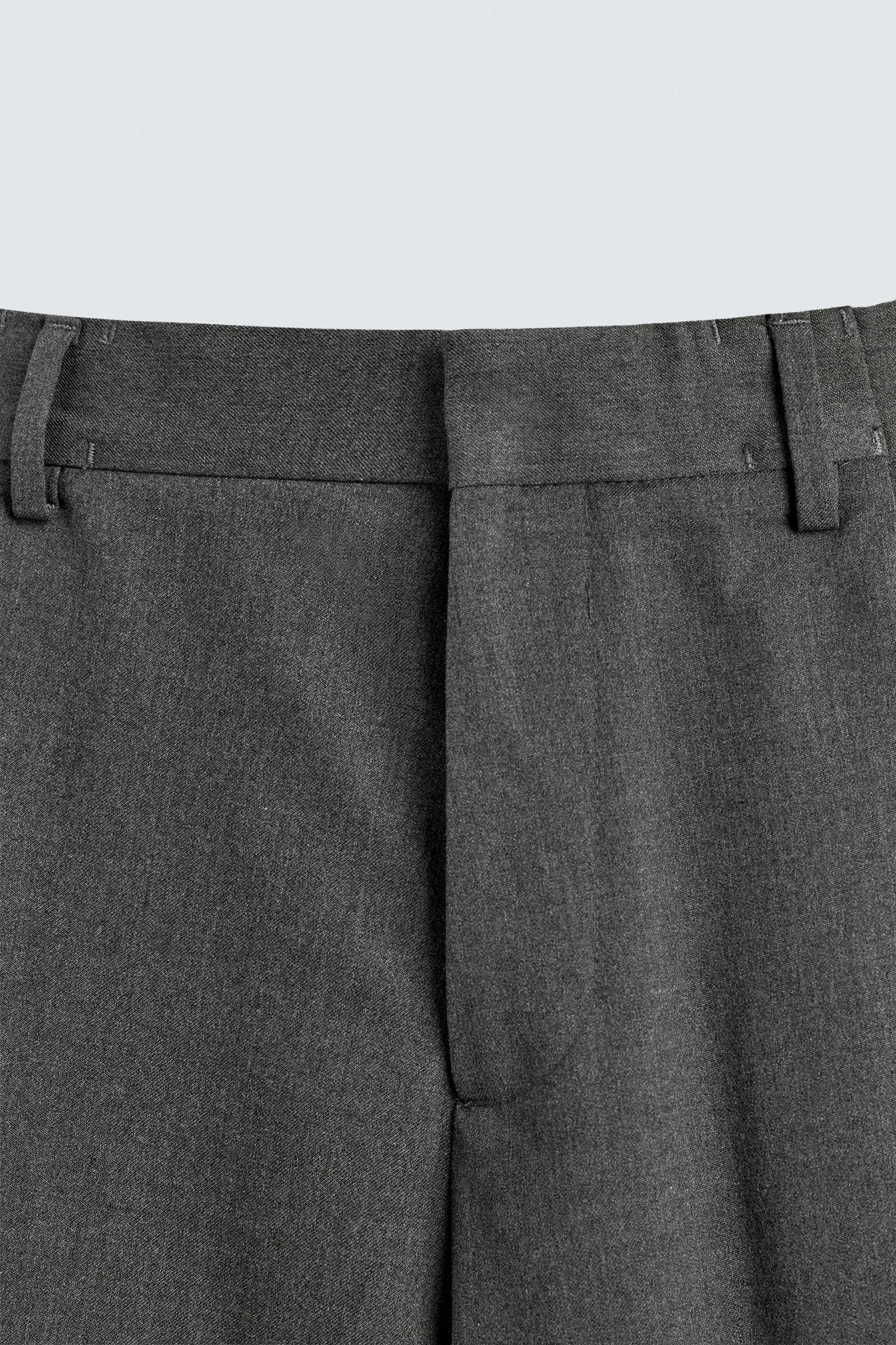 PLEATED WIDE FIT PANTS