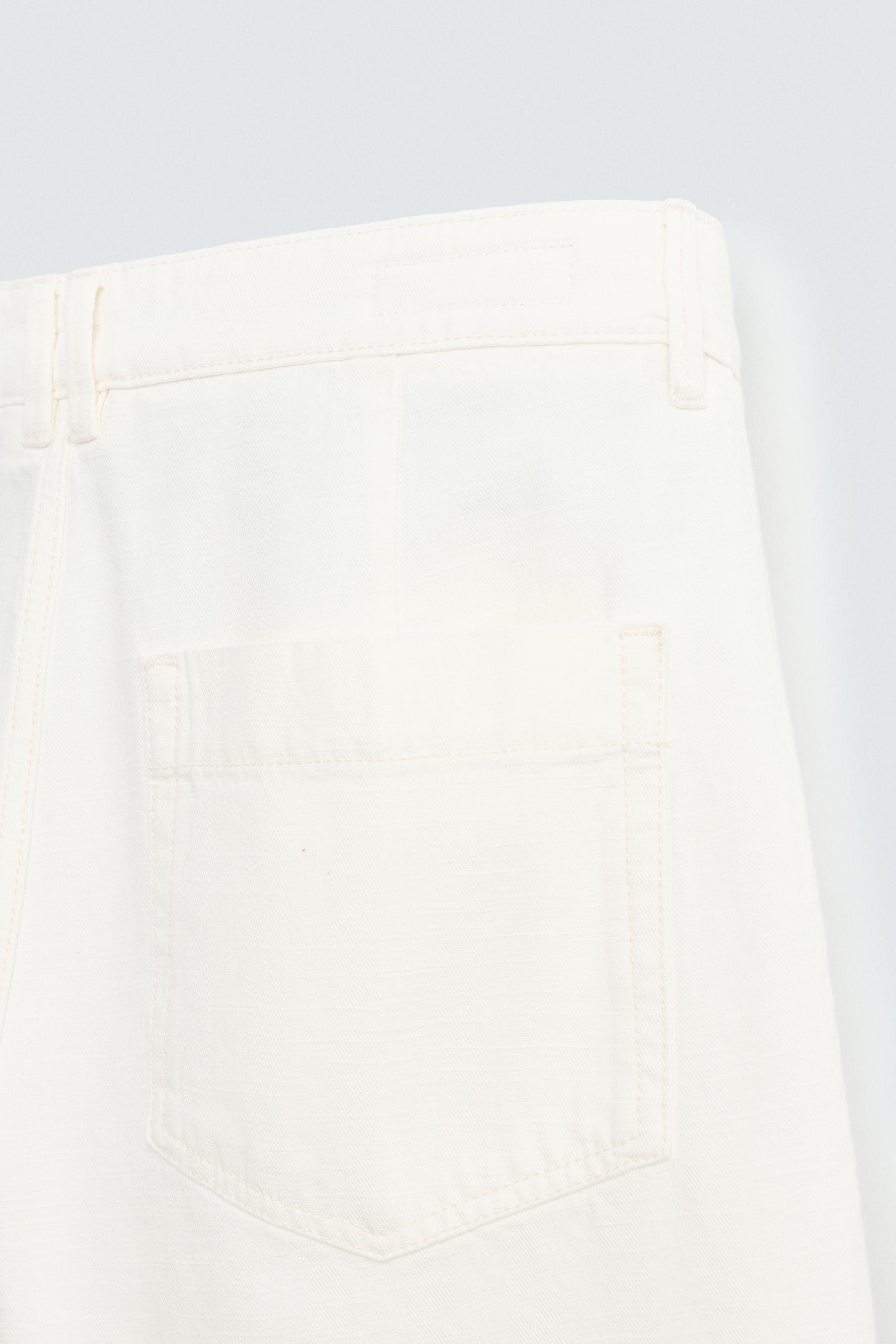 RELAXED FIT PLEATED BERMUDA SHORTS