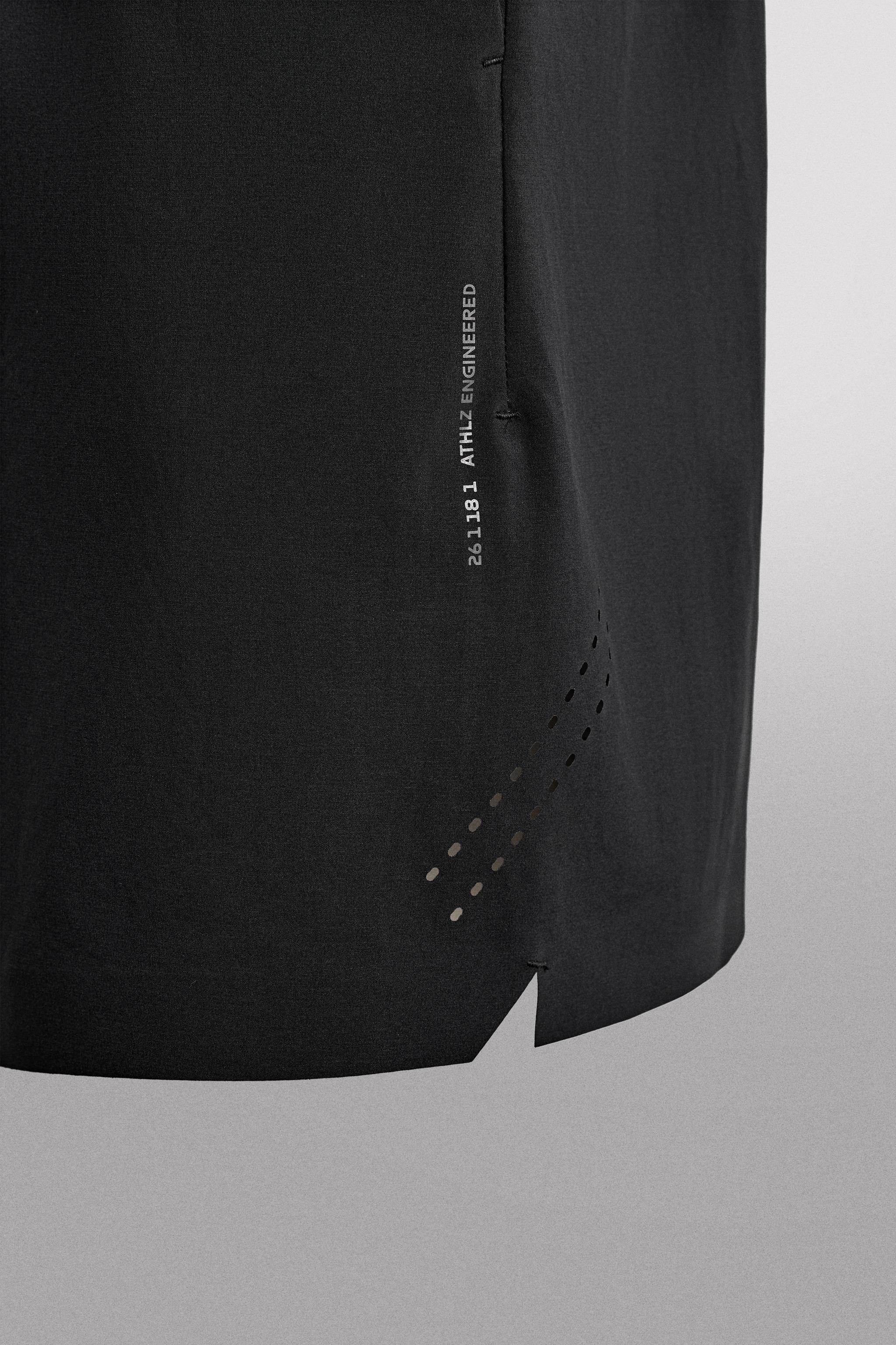 LIGHTWEIGHT PERFORATED SHORTS
