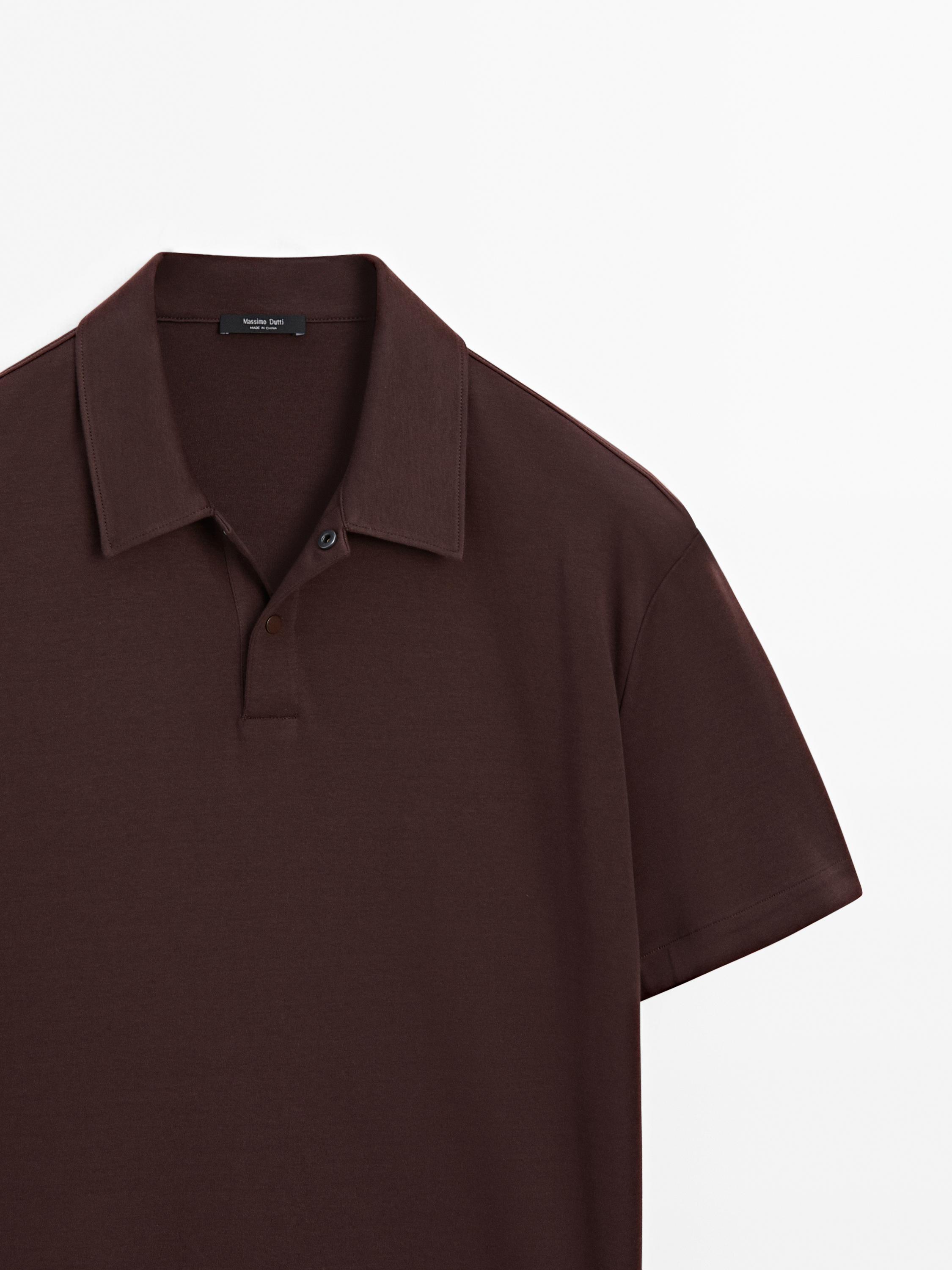Short sleeve polo shirt with snap-button placket