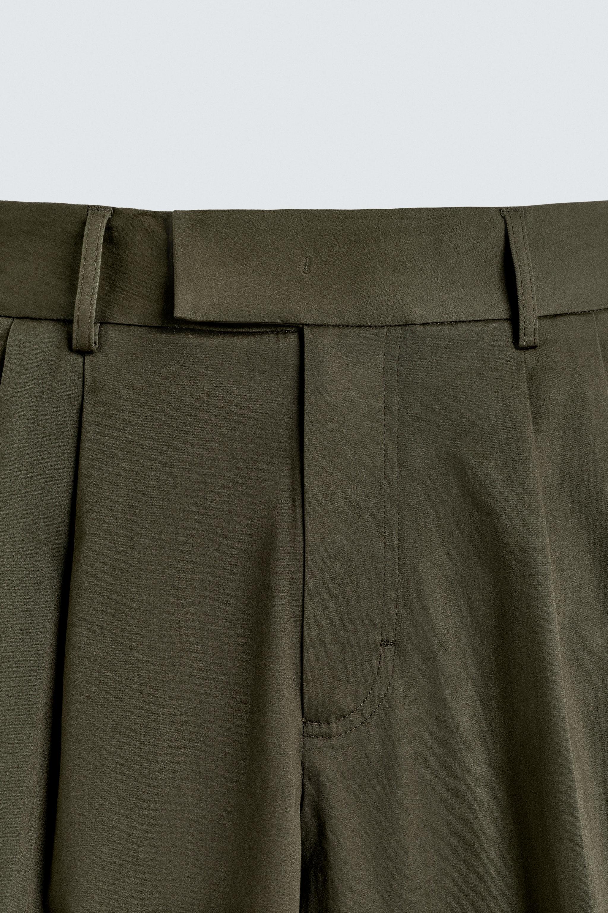 RELAXED FIT PLEATED PANTS