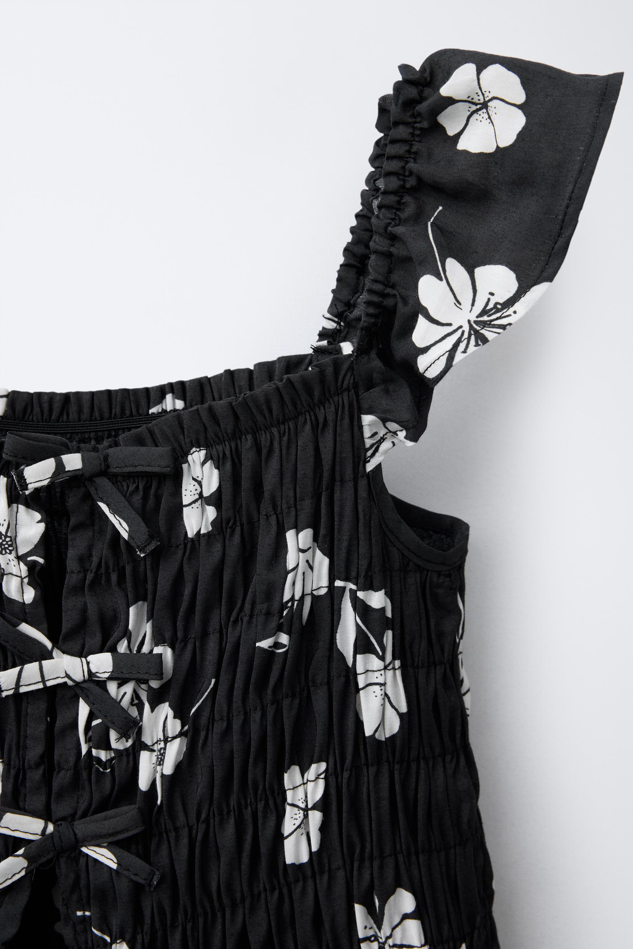 FLORAL SHORT JUMPSUIT