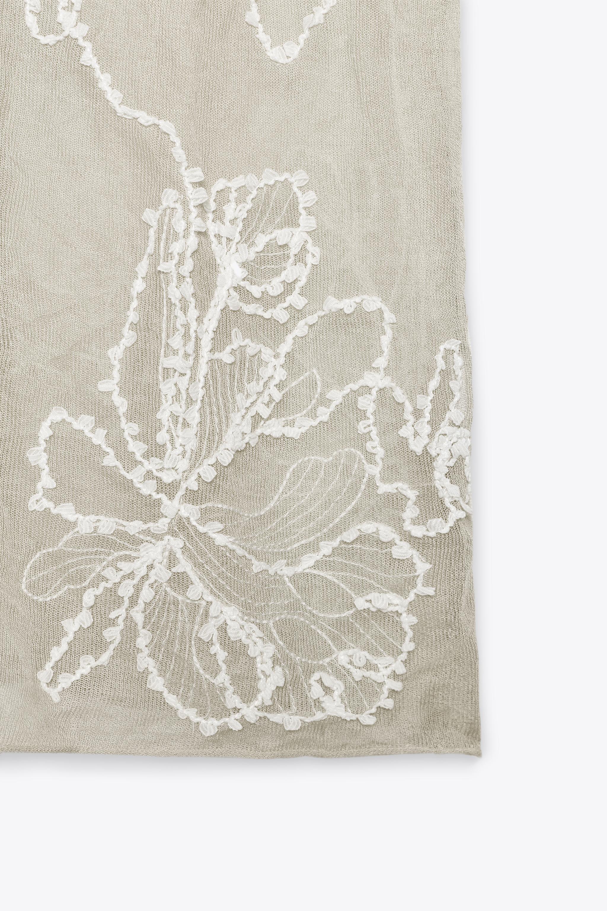 SEMI-SHEER STRUCTURED KNIT SKIRT