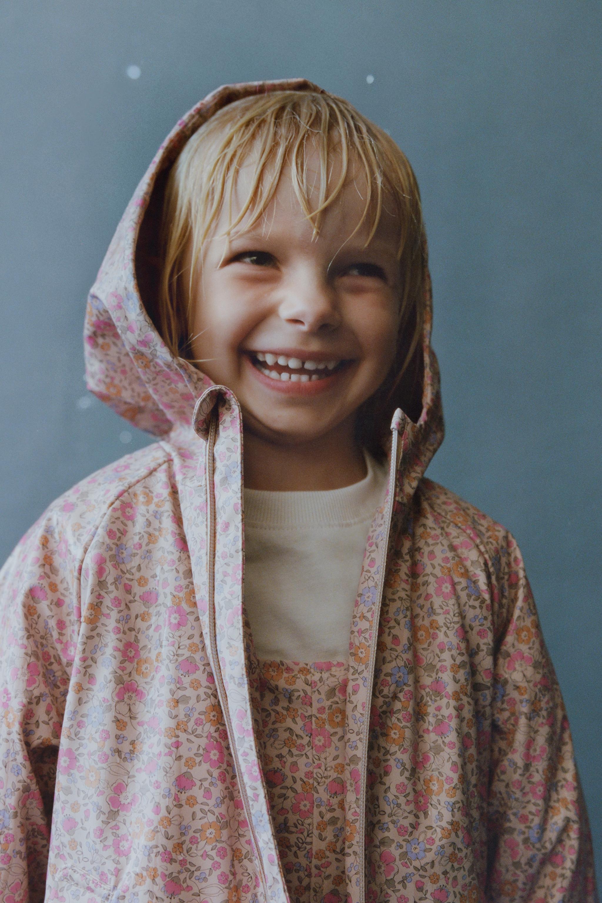 WATER RESISTANT PRINTED RUBBERIZED RAINCOAT