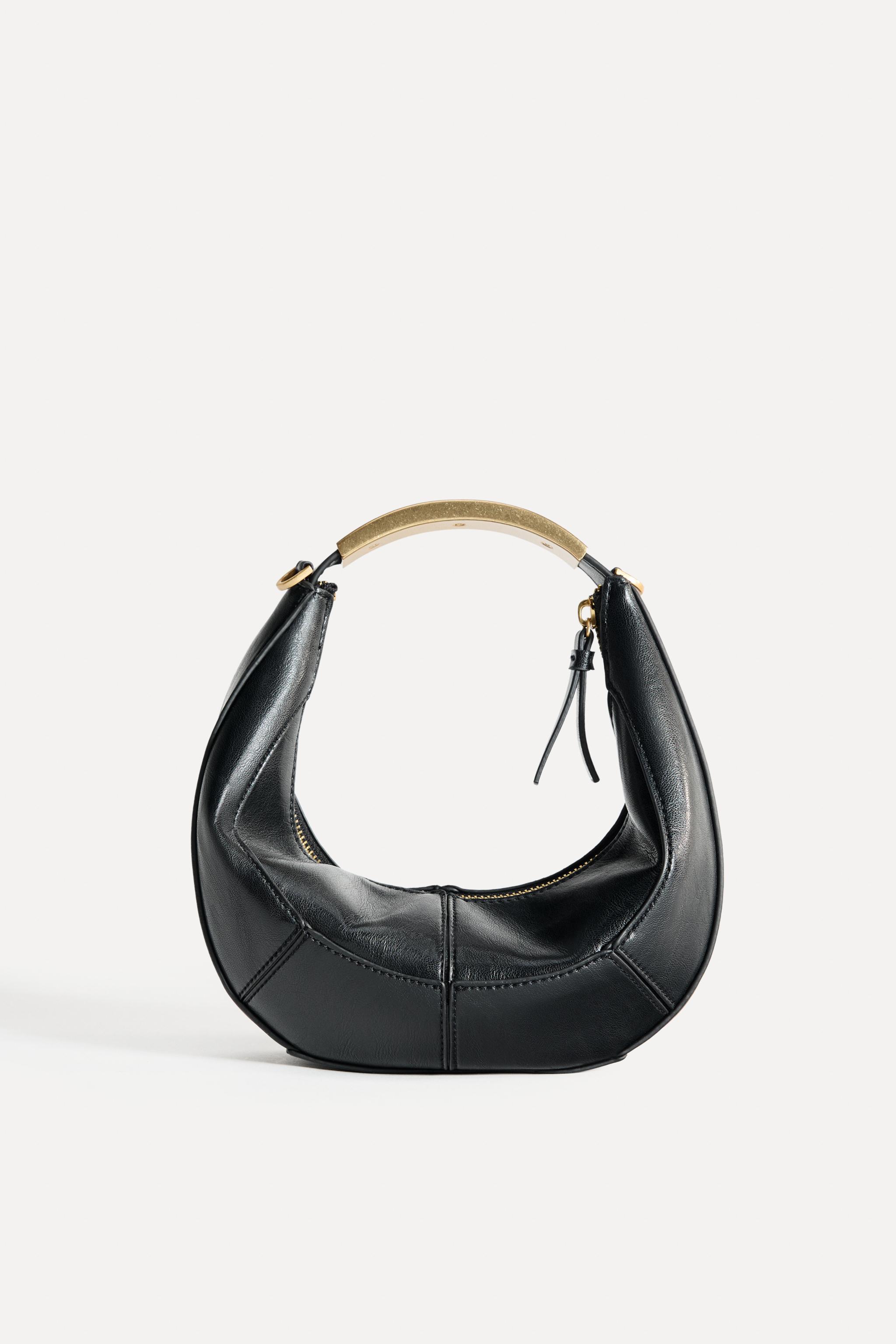 OVAL BAG WITH METAL HANDLE