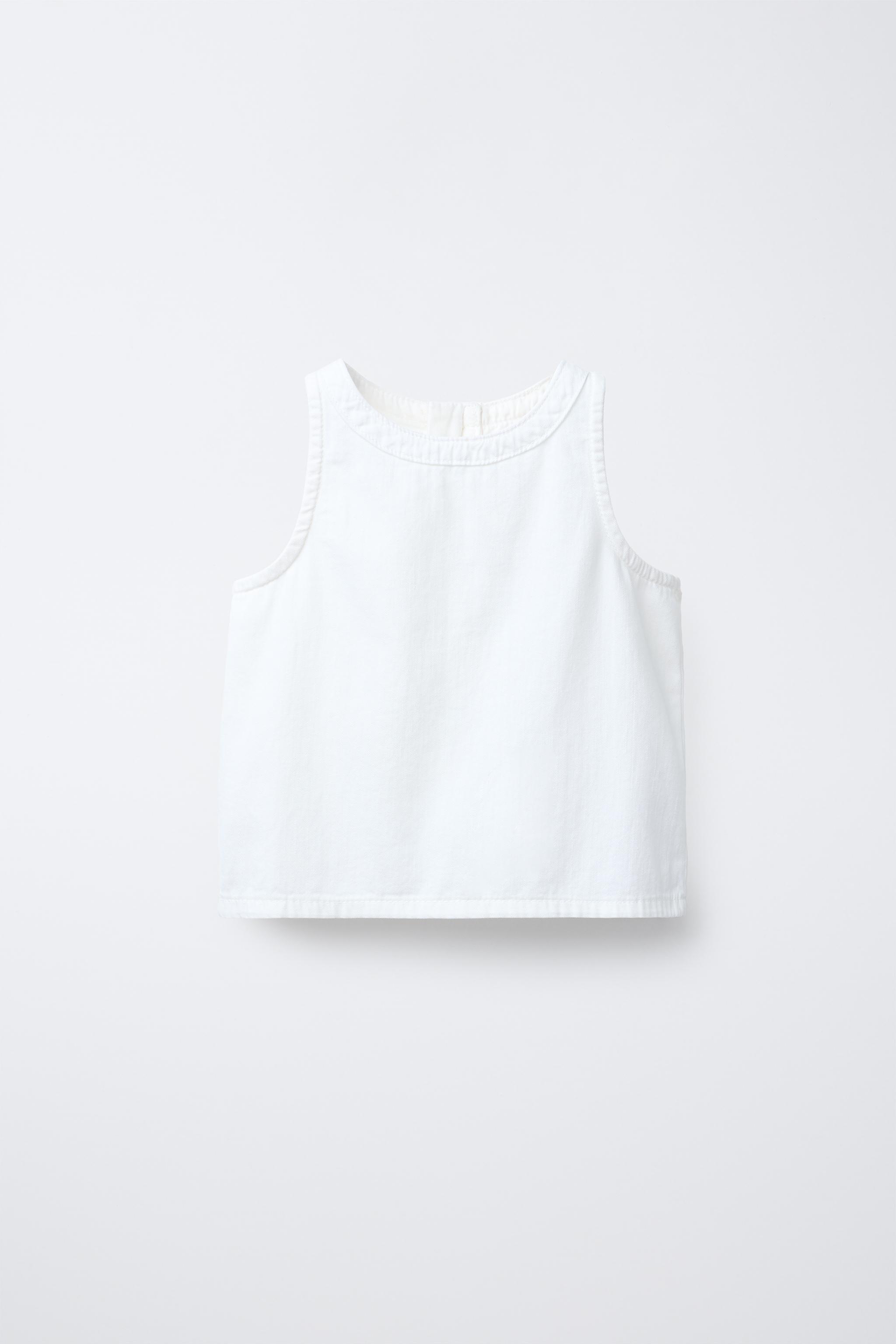 SLEEVELESS ZIP TOP