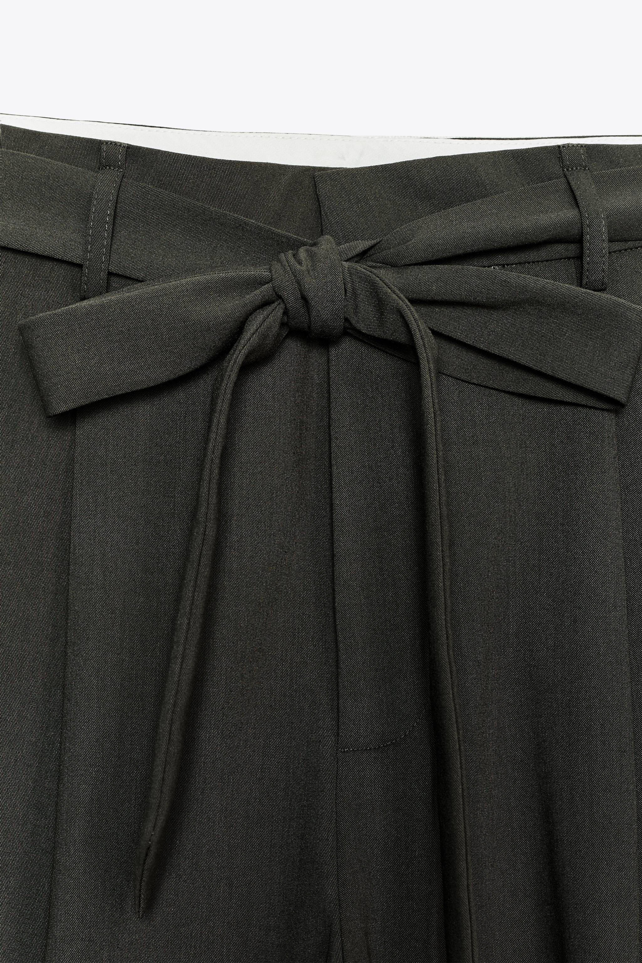 PLEATED BELTED PANTS