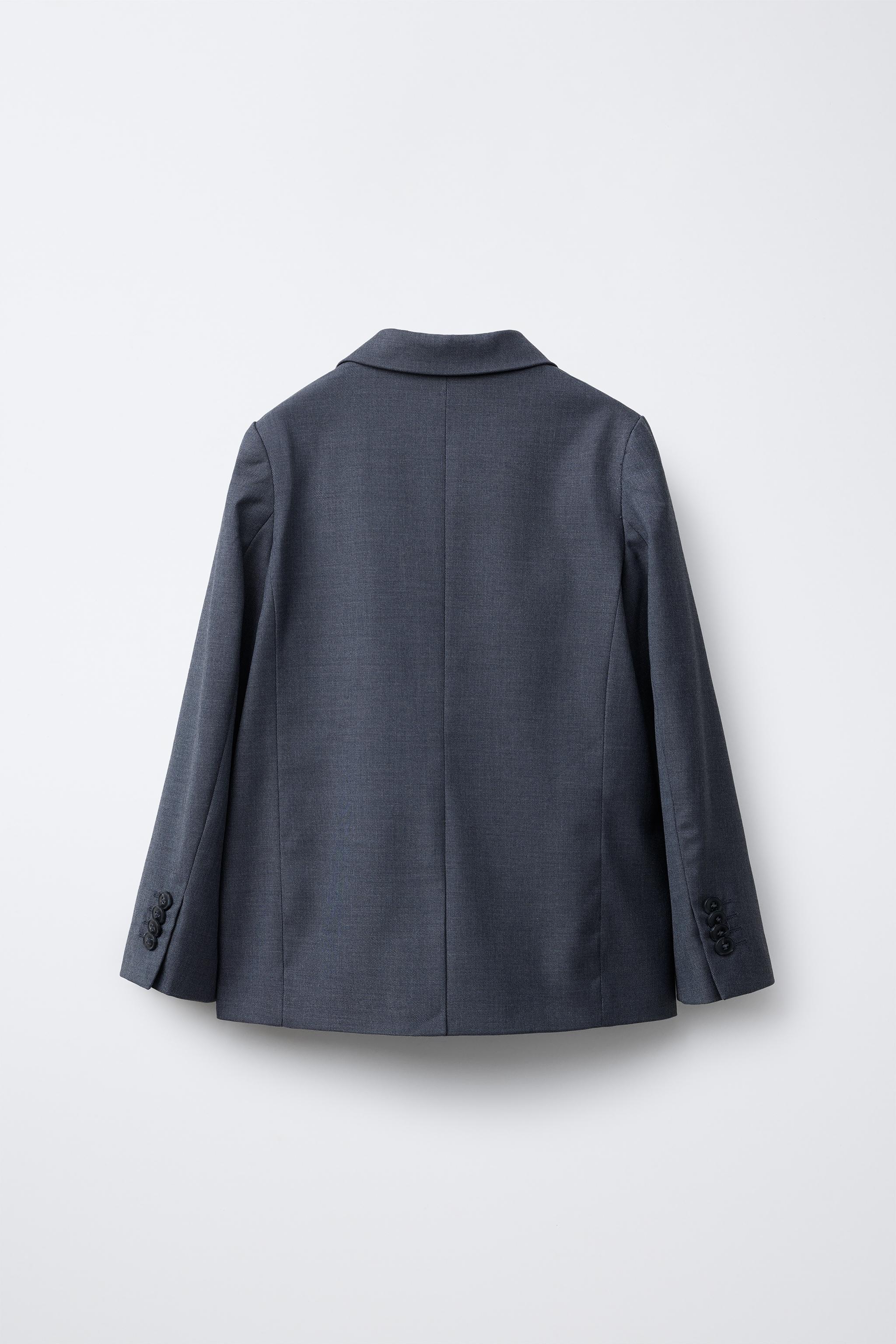 TEXTURED SUIT JACKET