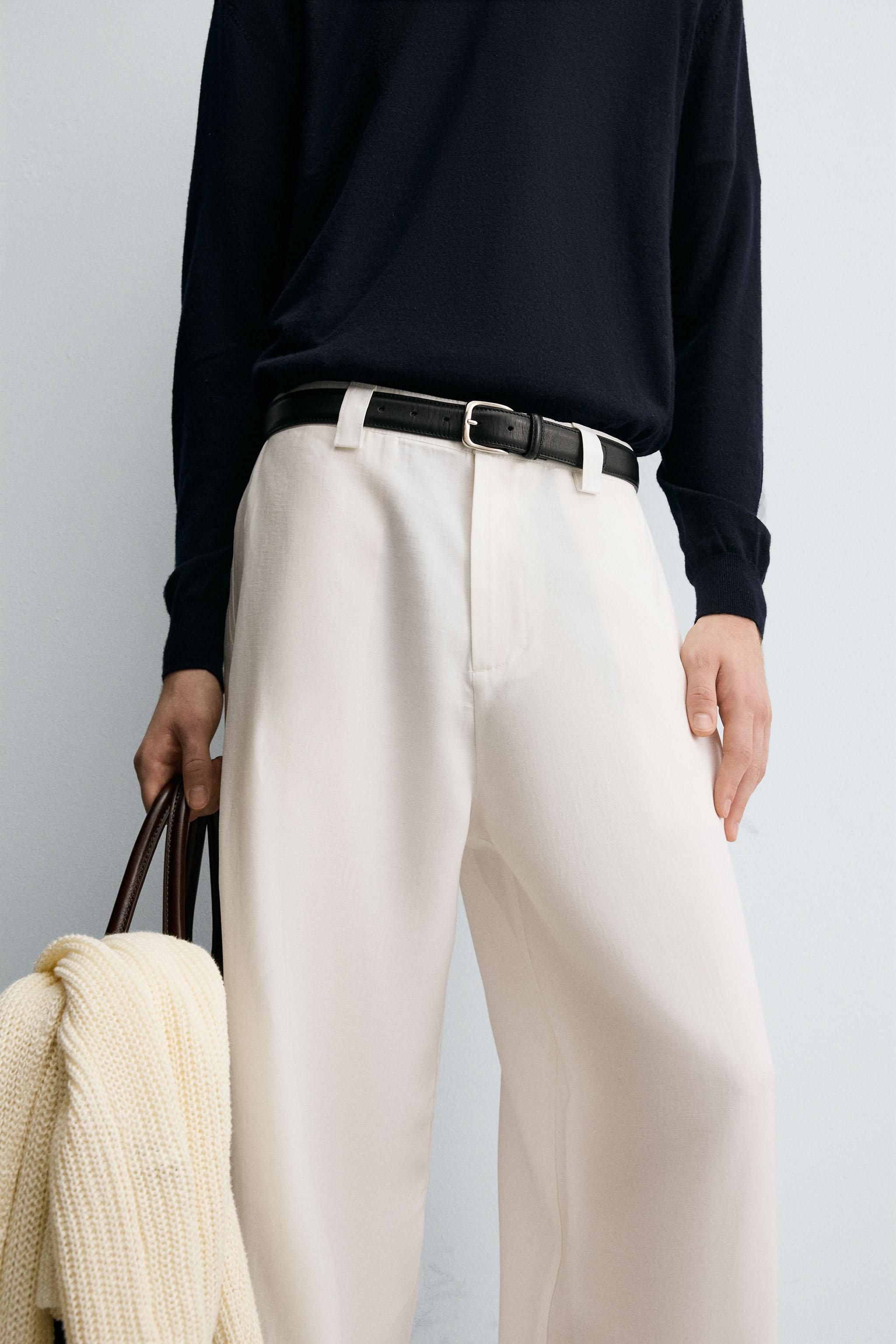 FLOWY PANTS WITH SIDE PLEATS