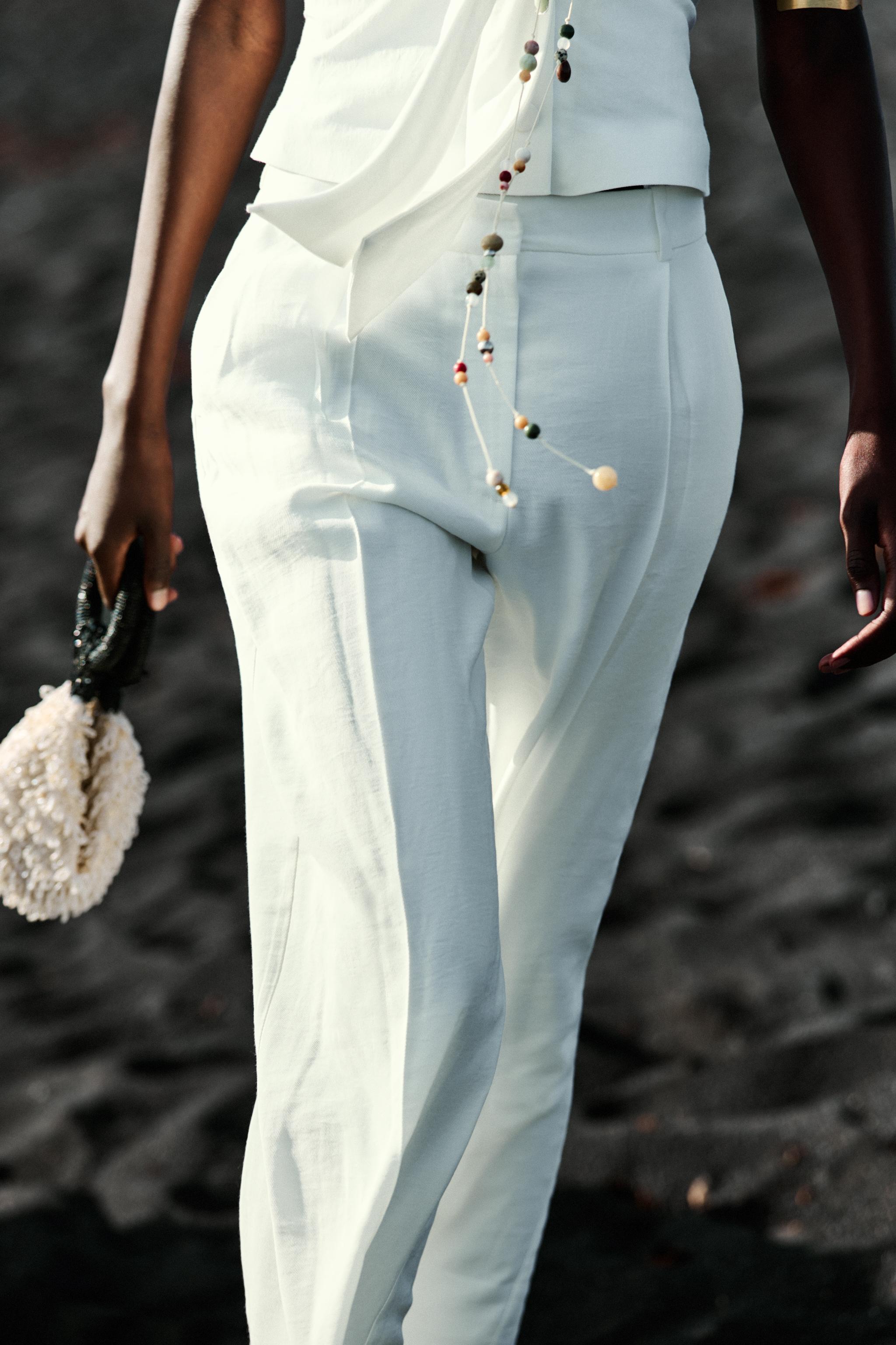 PLEATED WIDE LEG PANTS