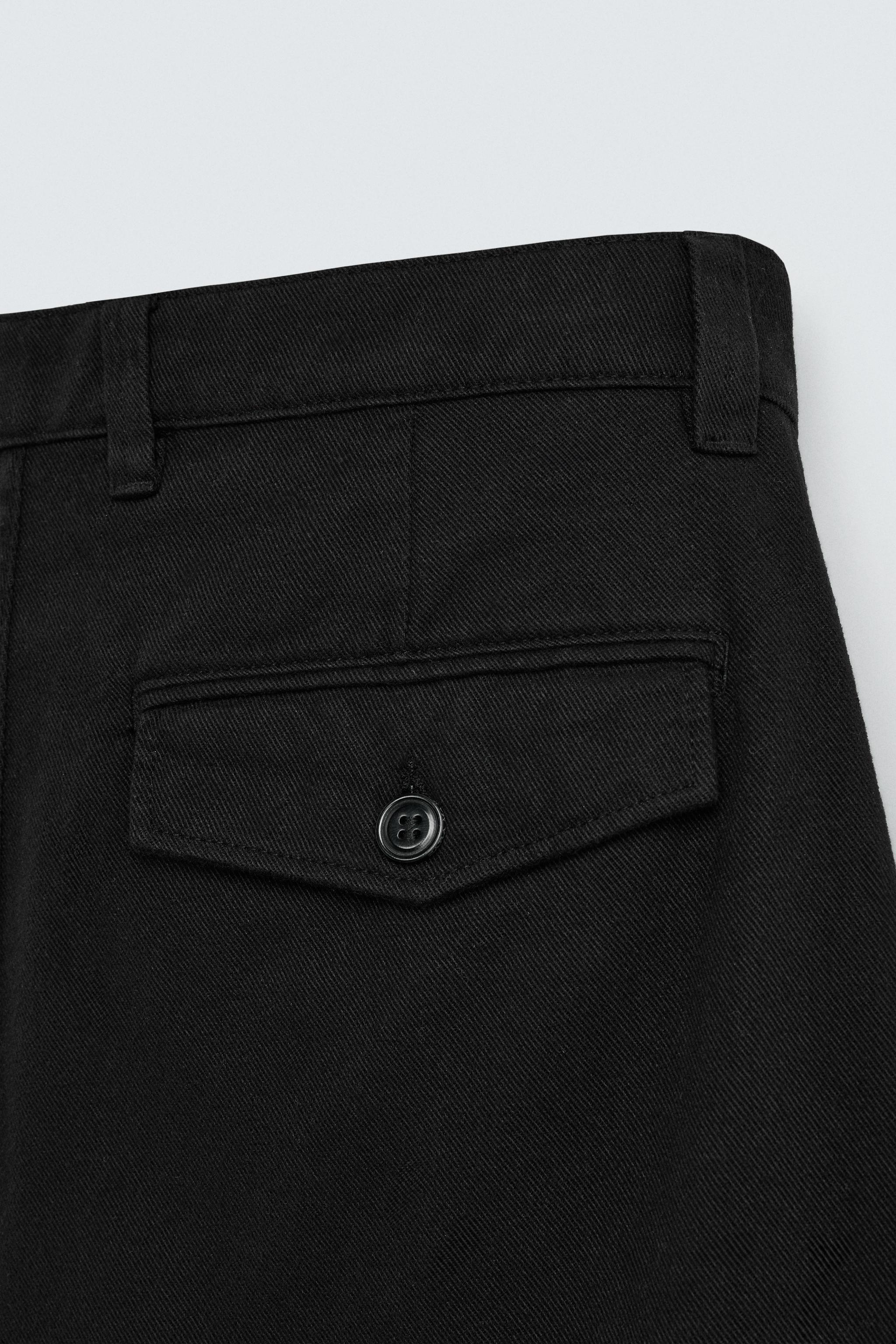 RELAXED FIT PLEATED BERMUDA SHORTS