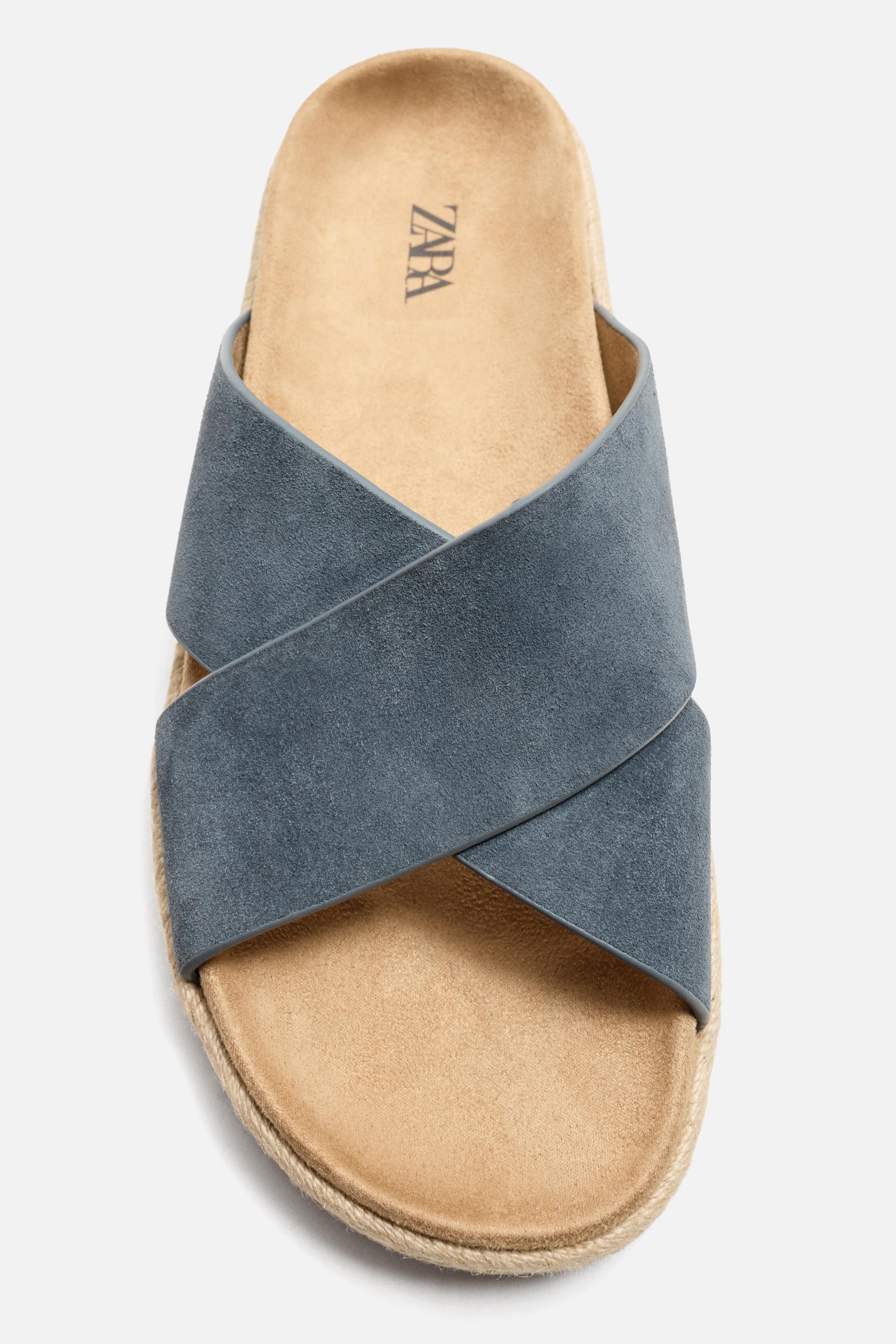 CROSSED LEATHER SANDALS