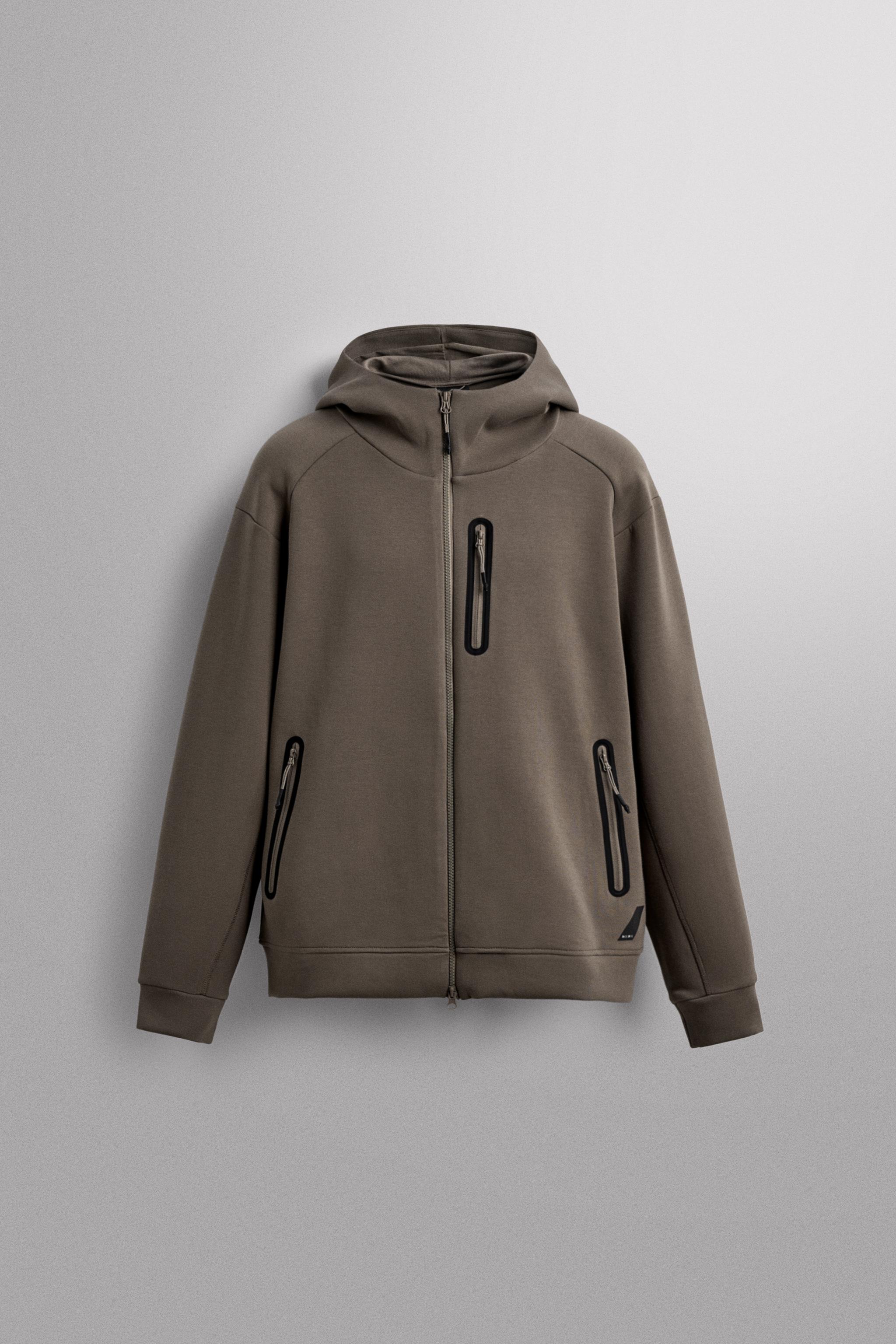 TECHNICAL ZIP-UP HOODIE