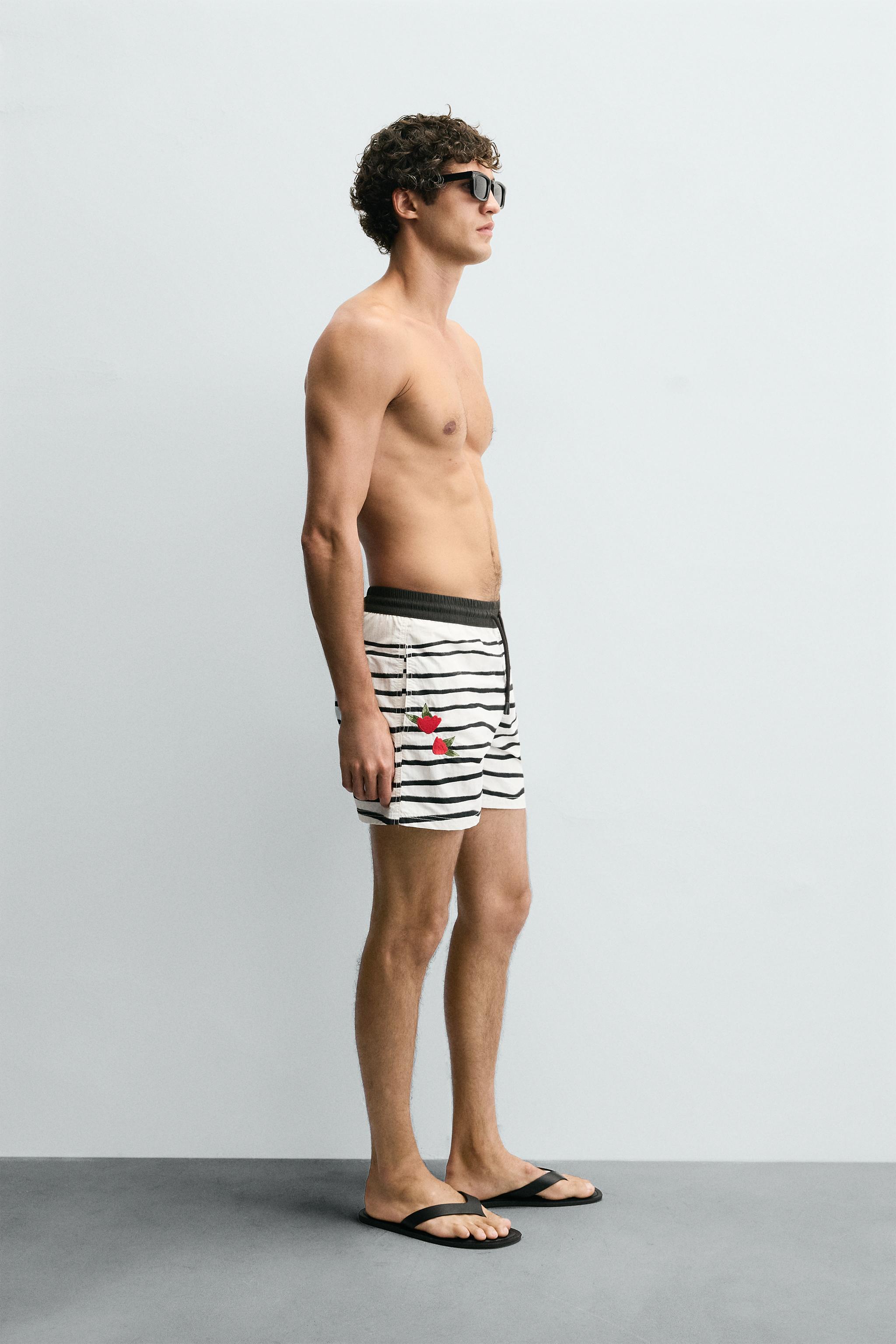 OTIS KWAME KYE QUAICOE PRINTED MID-LENGTH SWIMSUIT