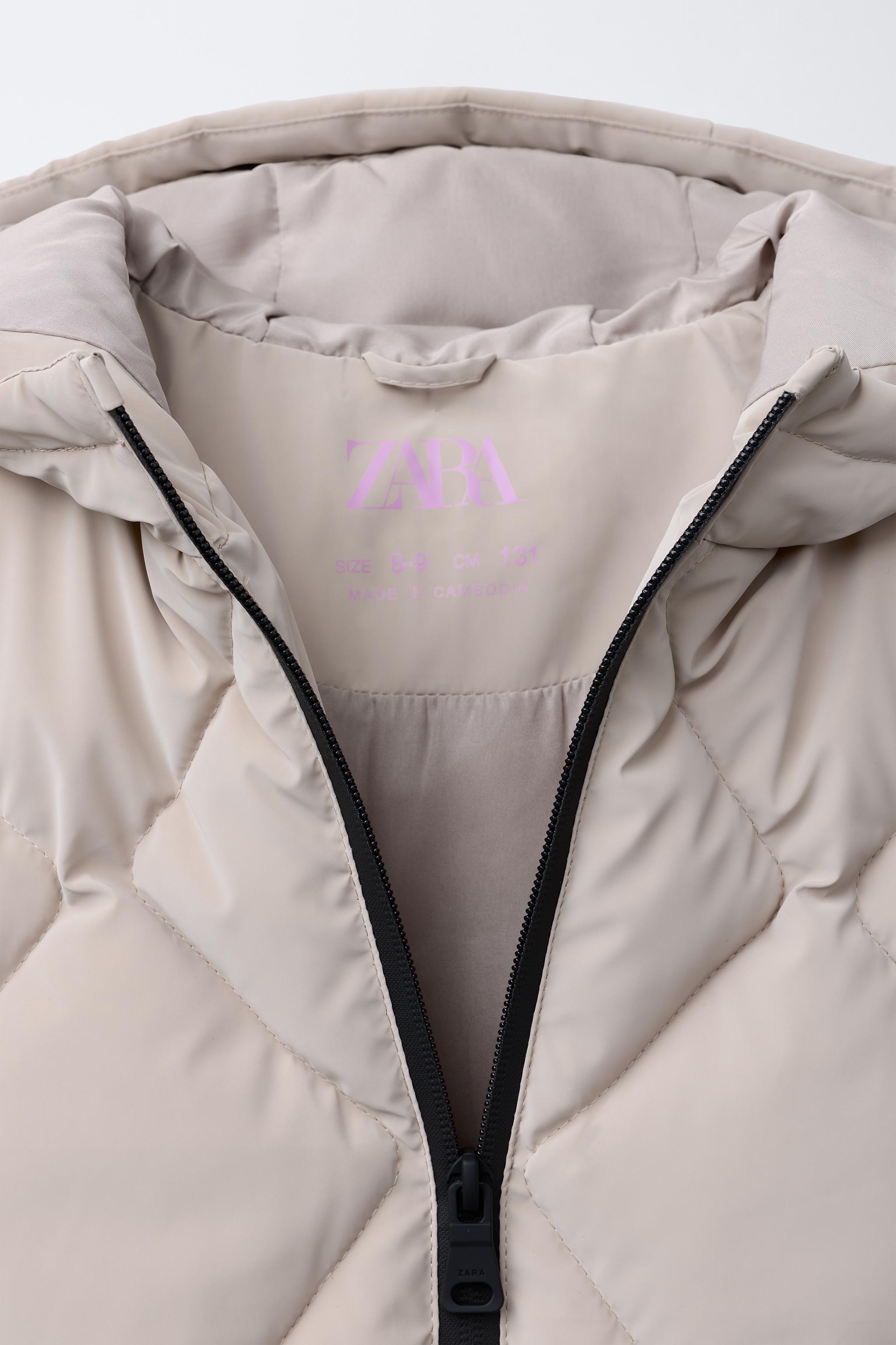 LIGHTWEIGHT RUBBERIZED PUFFER COAT
