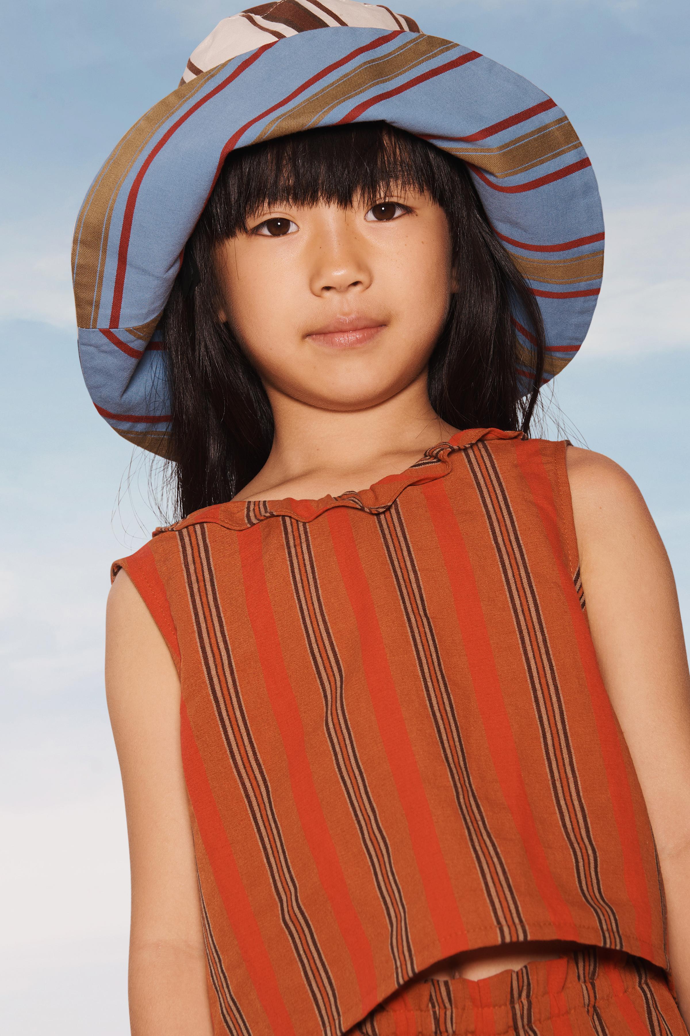 LIMITED EDITION RUFFLED STRIPED TOP