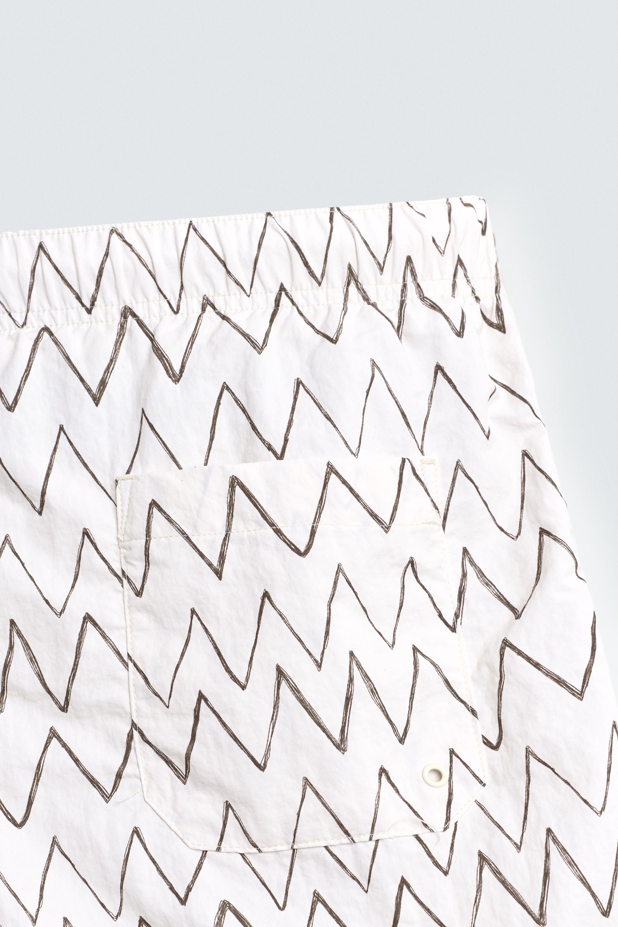 GEOMETRIC PRINT MID-LENGTH SWIMSUIT