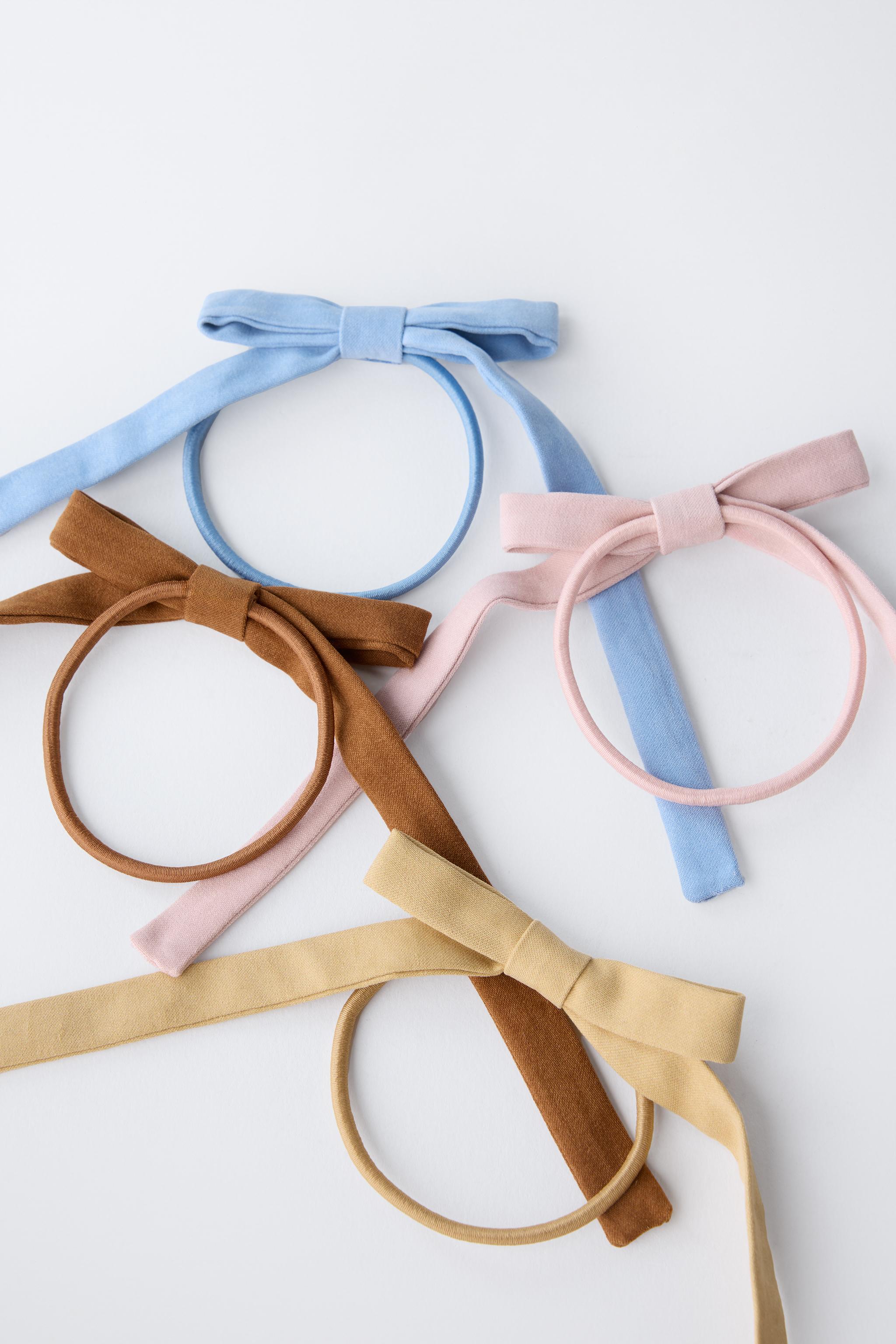 FOUR-PACK OF FAUX SUEDE BOW HAIR TIES