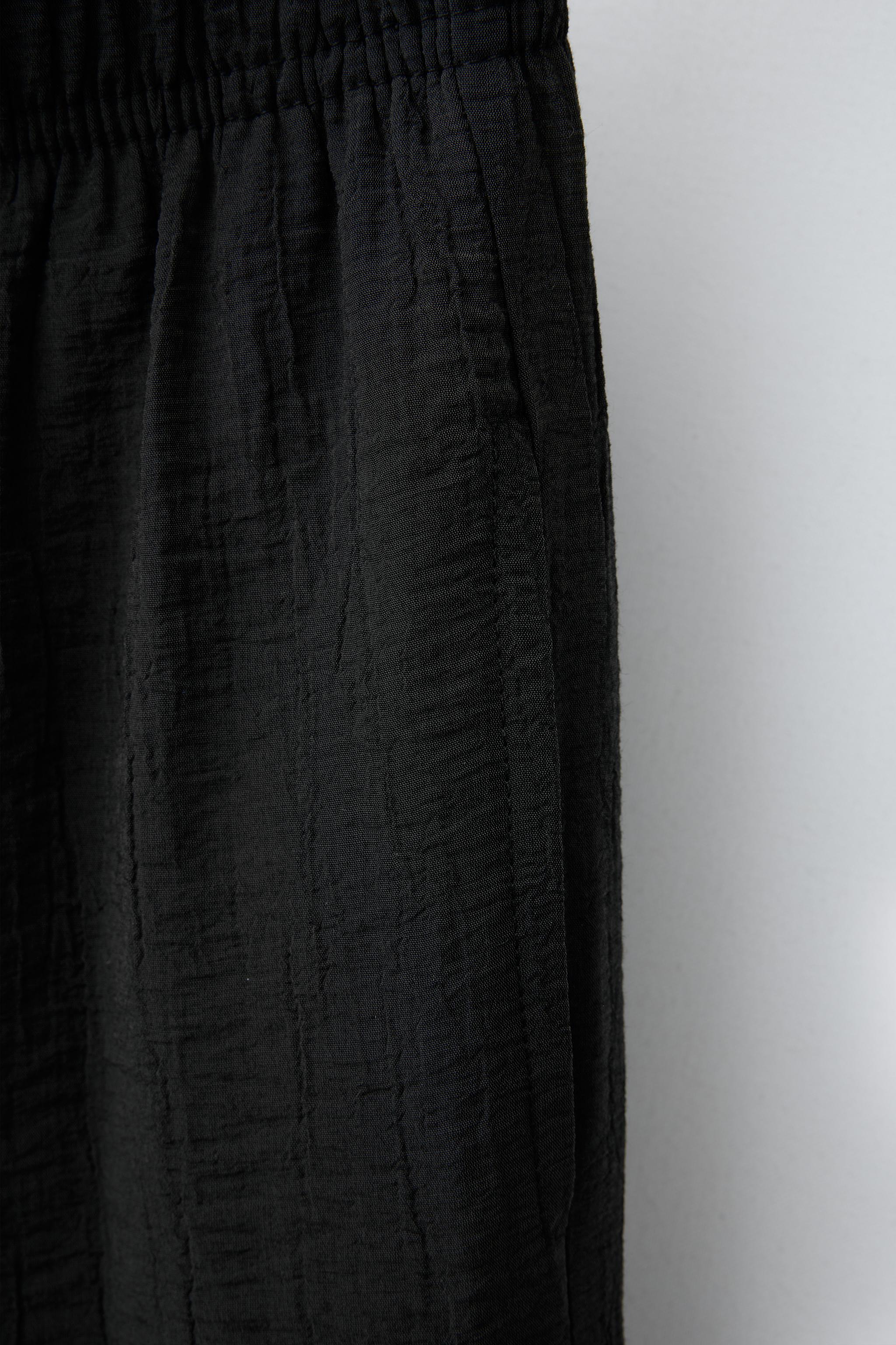 WRINKLED EFFECT WIDE LEG PANTS