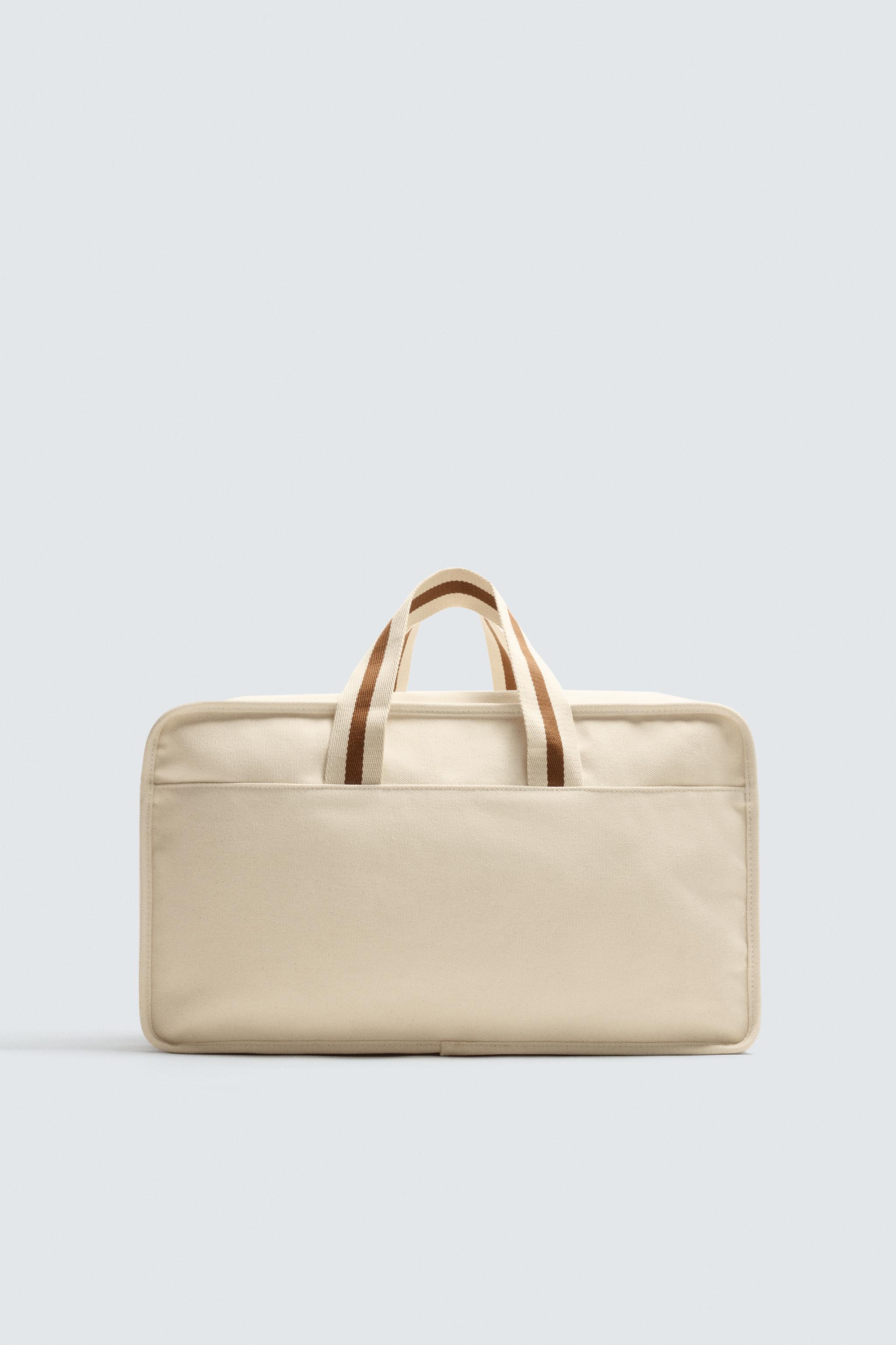 CONTRAST TRAVEL BAG