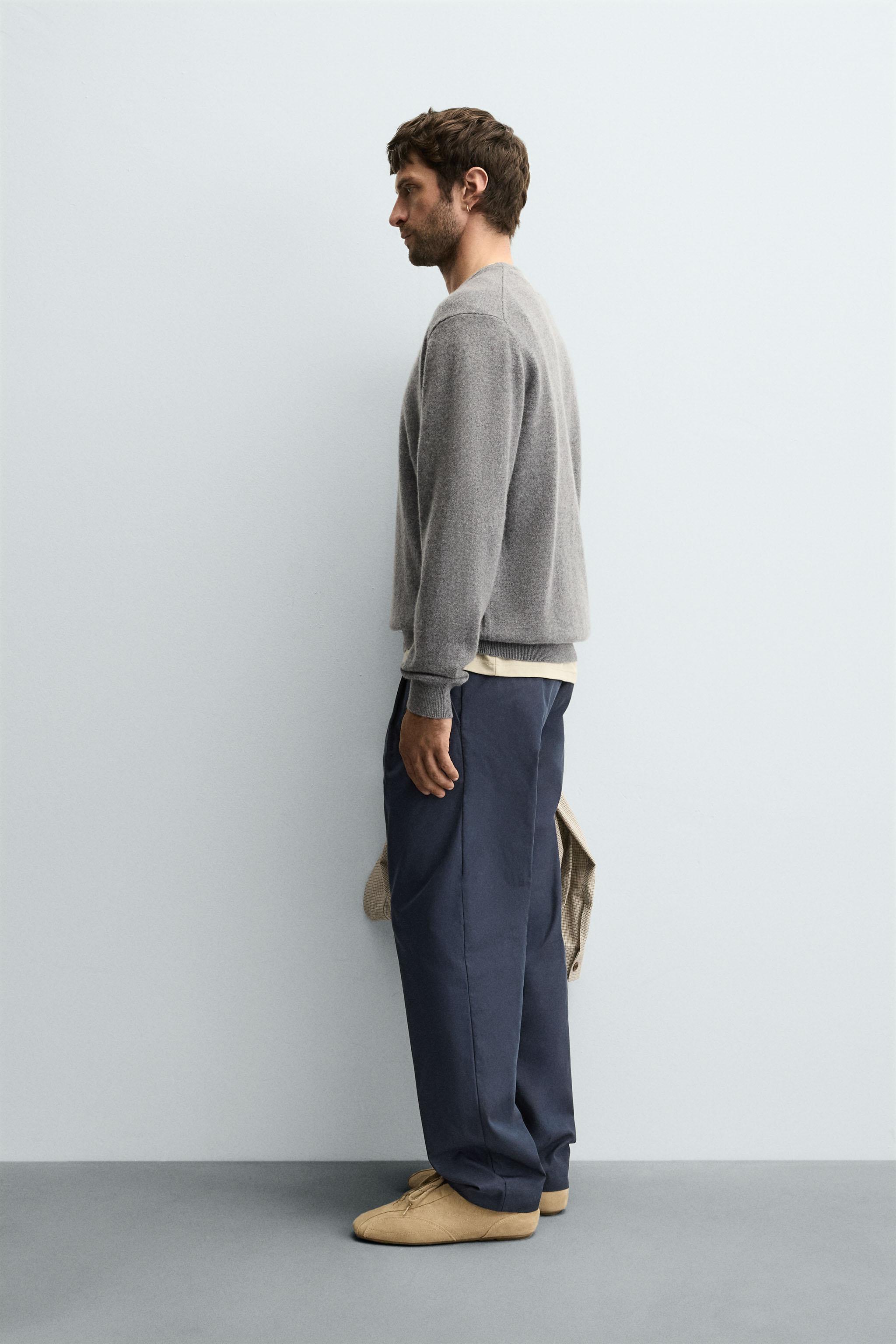 RELAXED FIT PLEATED PANTS