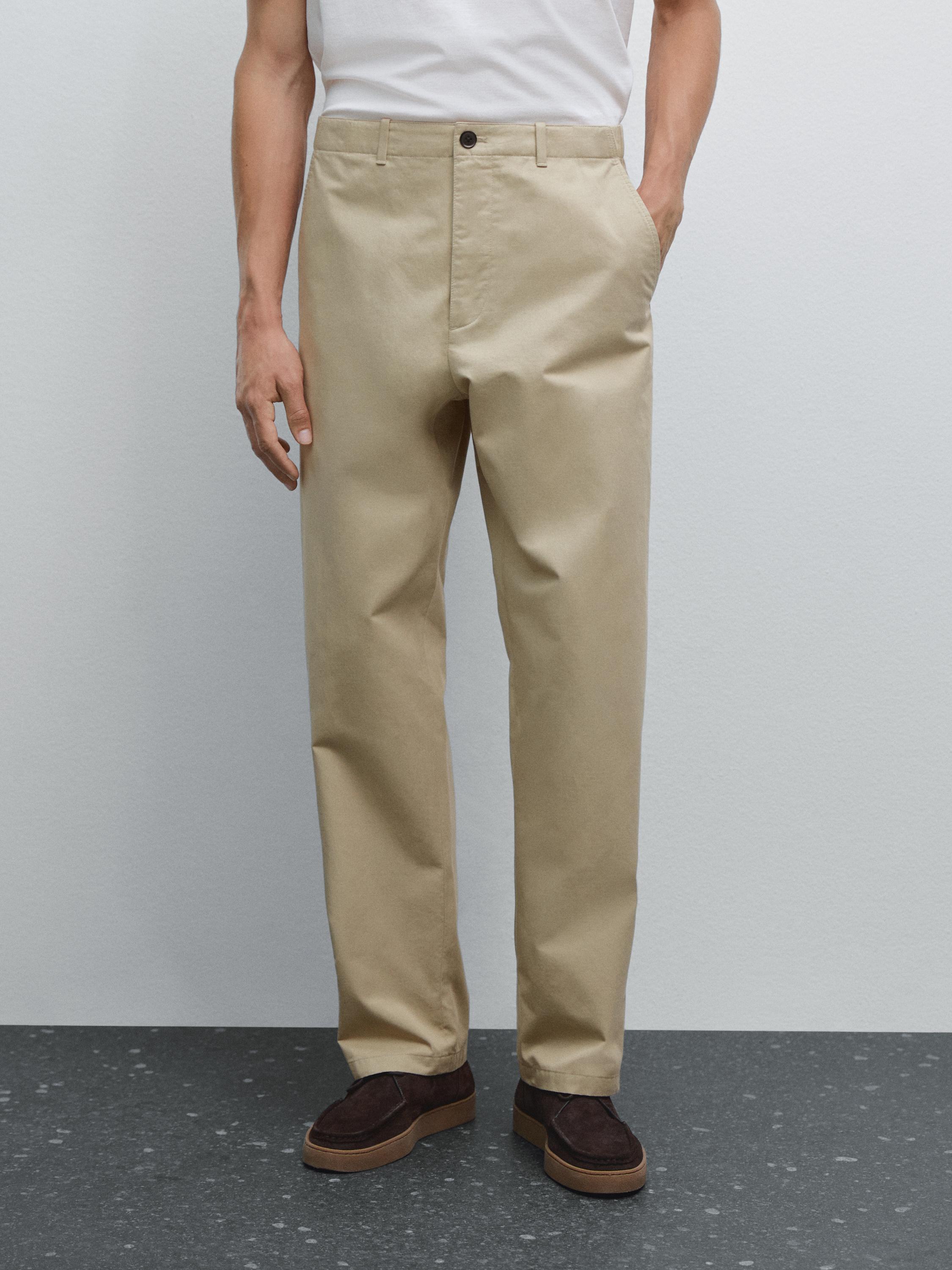 Trousers with patch pocket