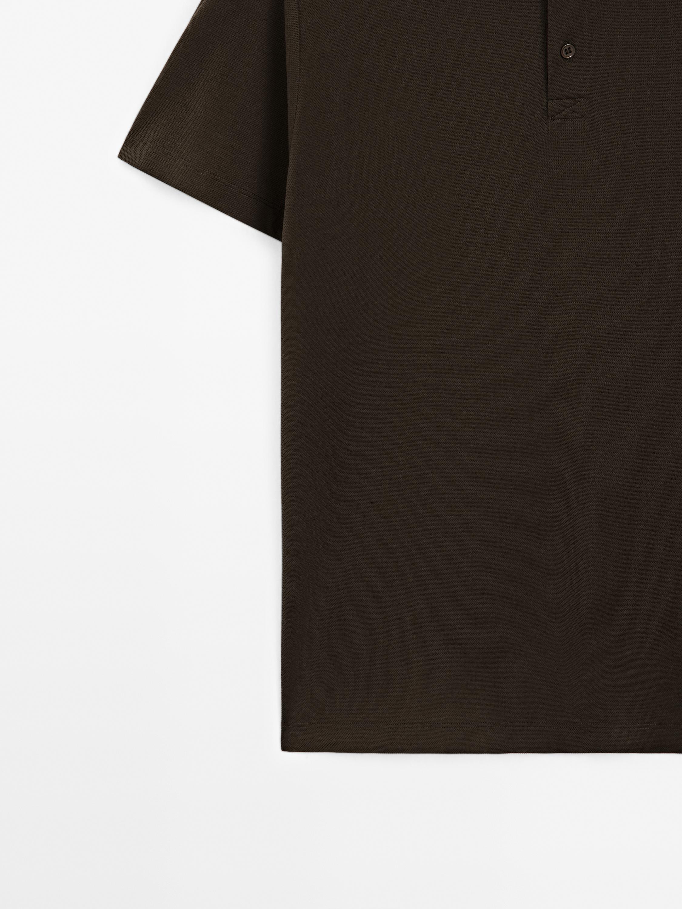 Textured short sleeve polo shirt