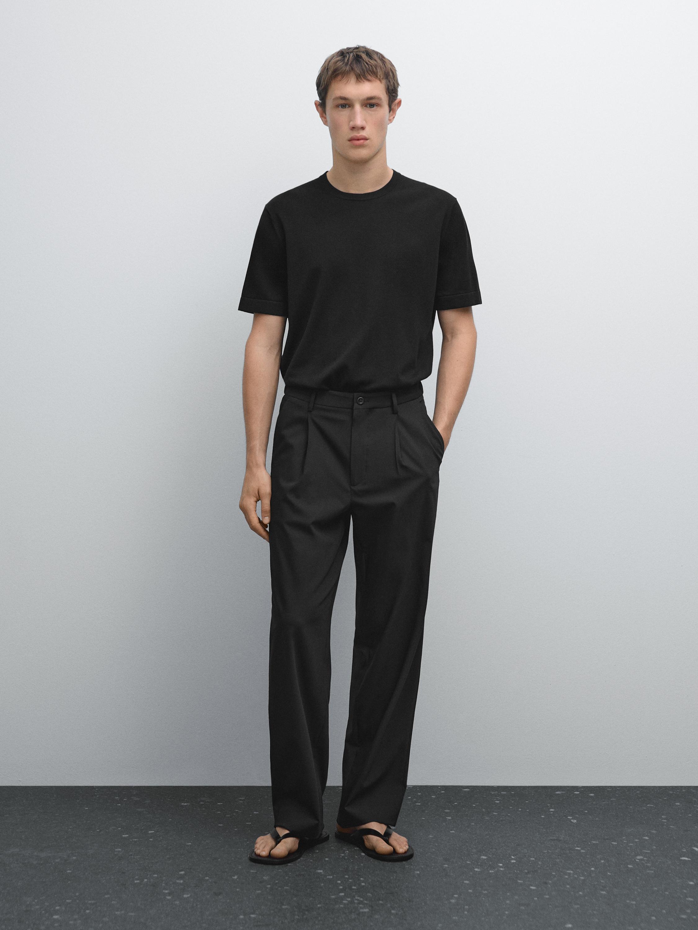 Relaxed fit trousers with darts