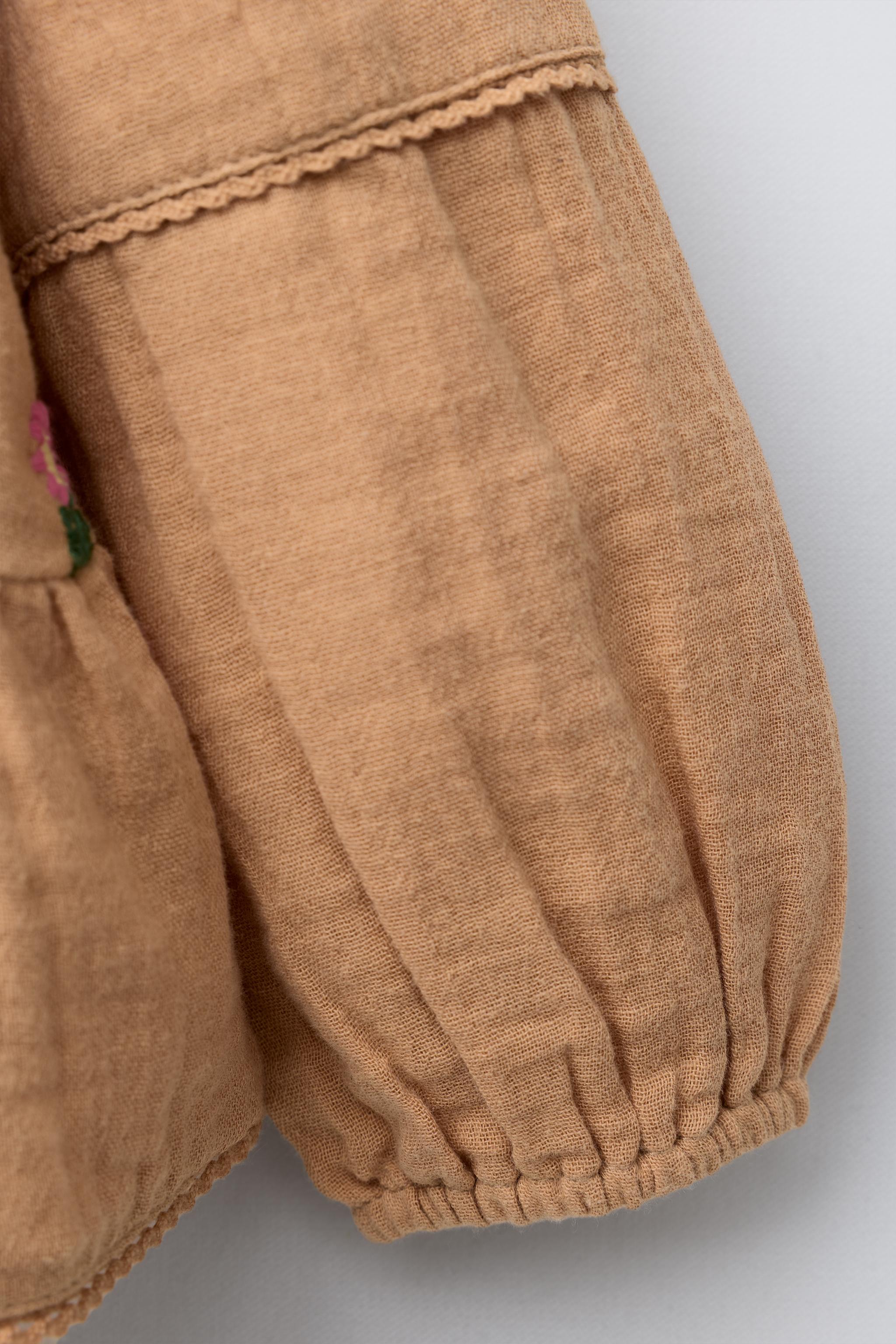 EMBROIDERED FLORAL TEXTURED BLOUSE