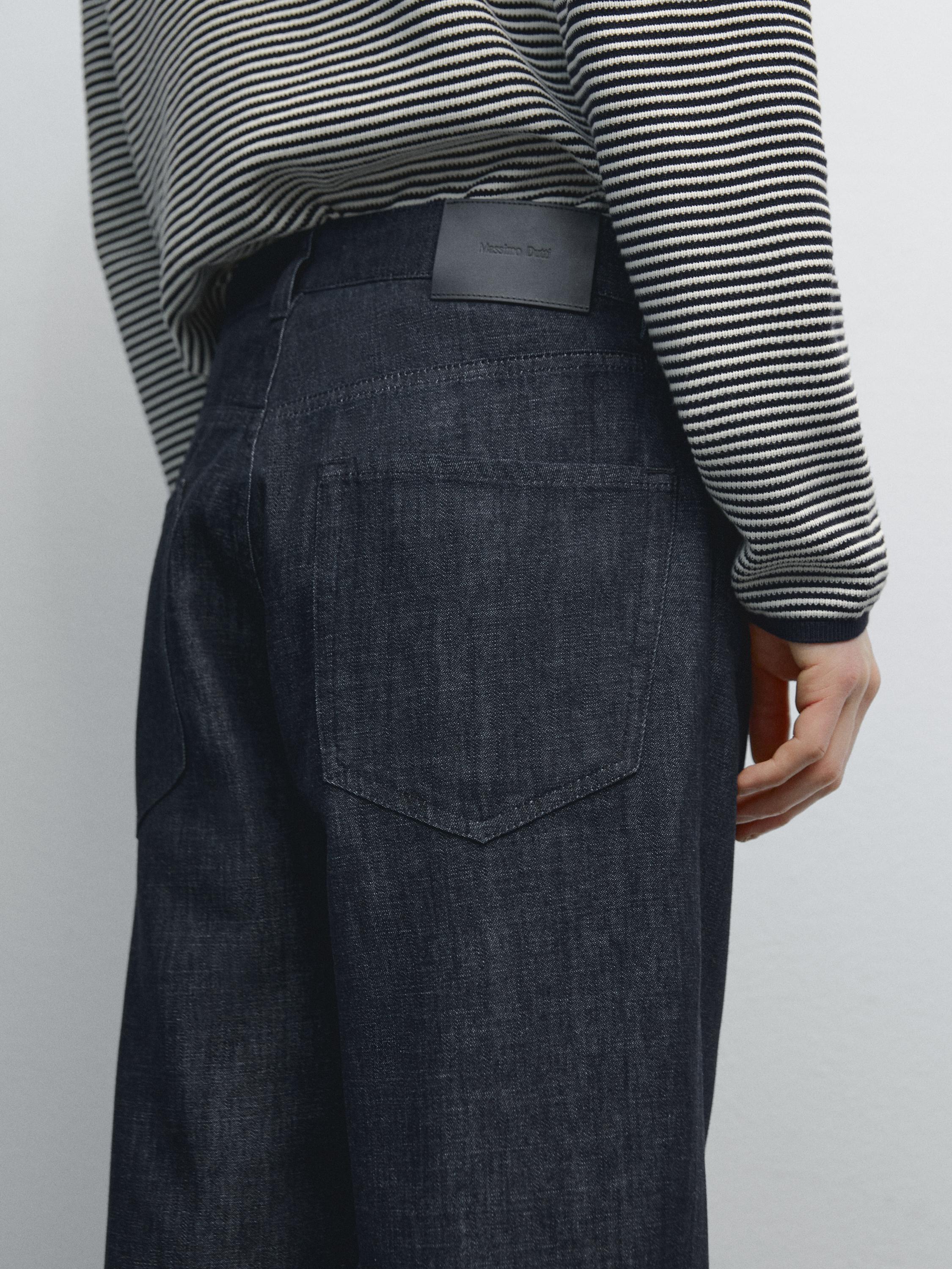 Cotton blend tapered fit jeans