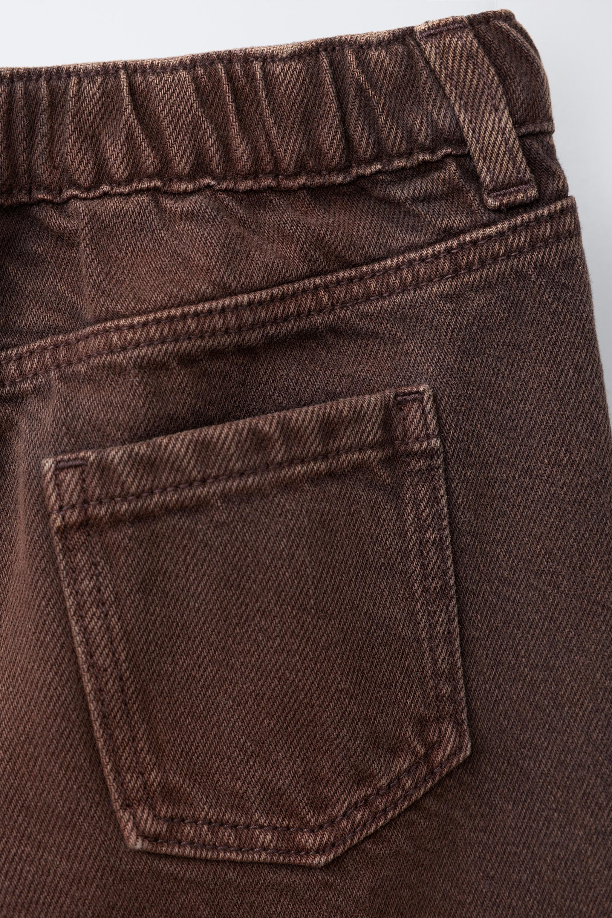 CROSSOVER WAIST WIDE LEG JEANS