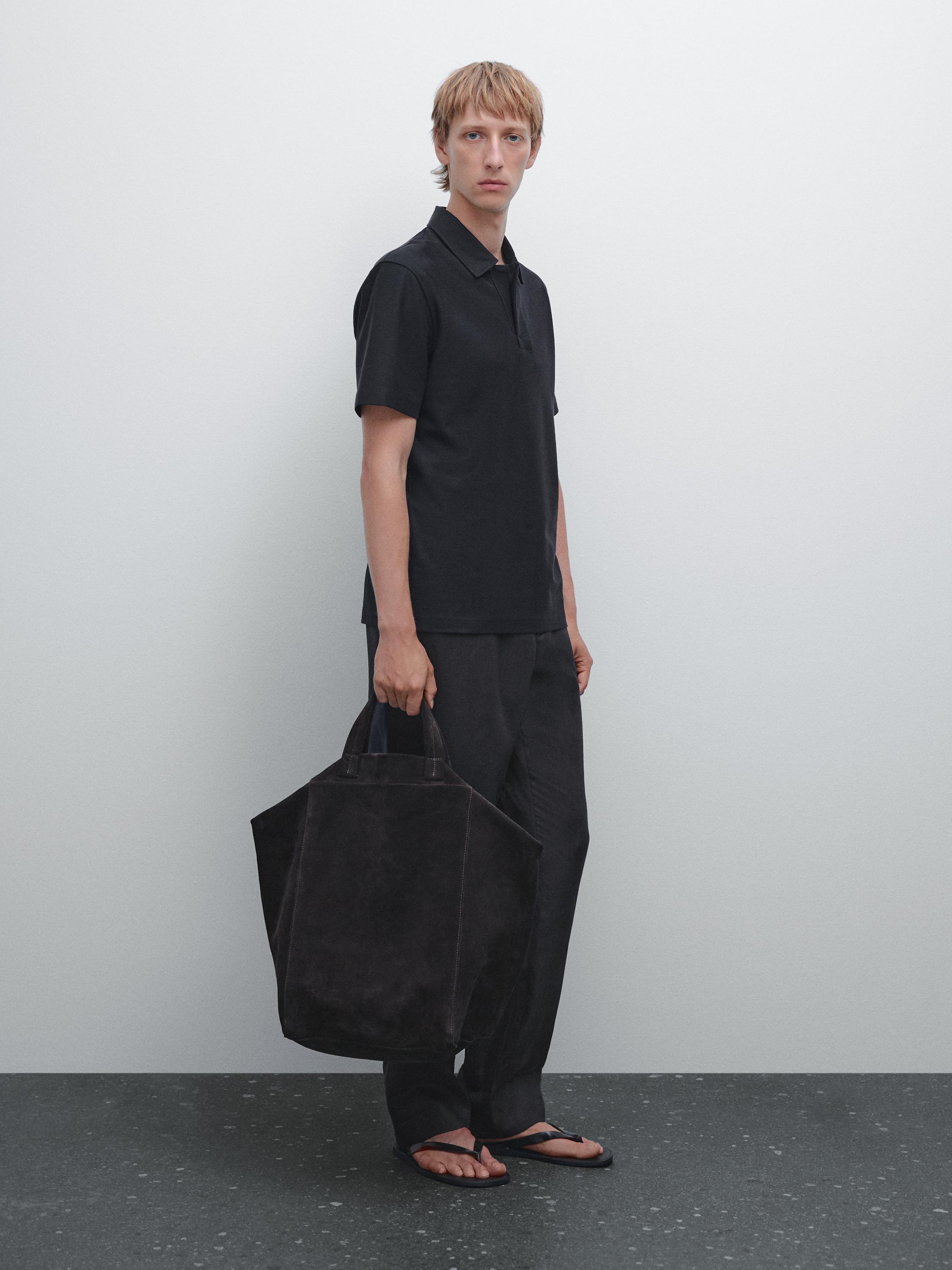 Textured polo shirt with hidden button