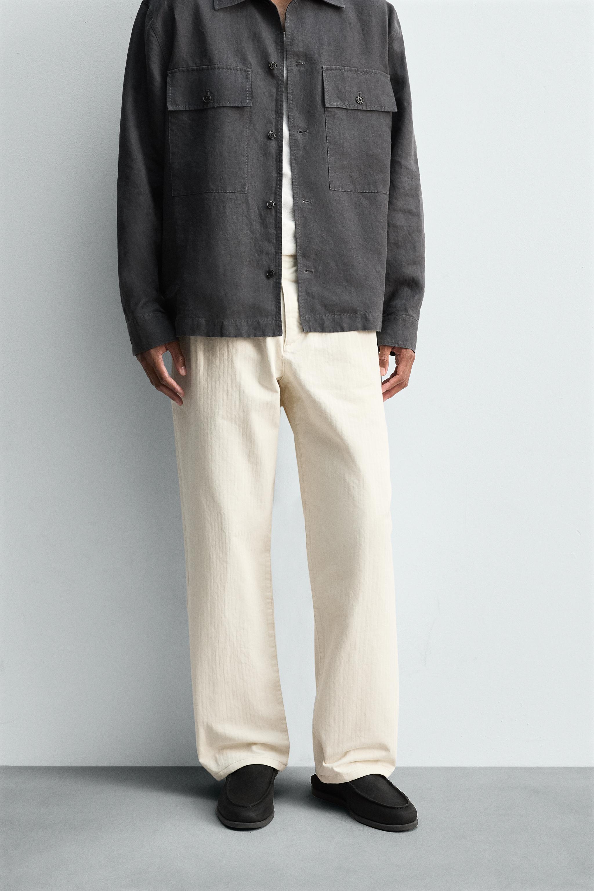 PLEATED HERRINGBONE PANTS