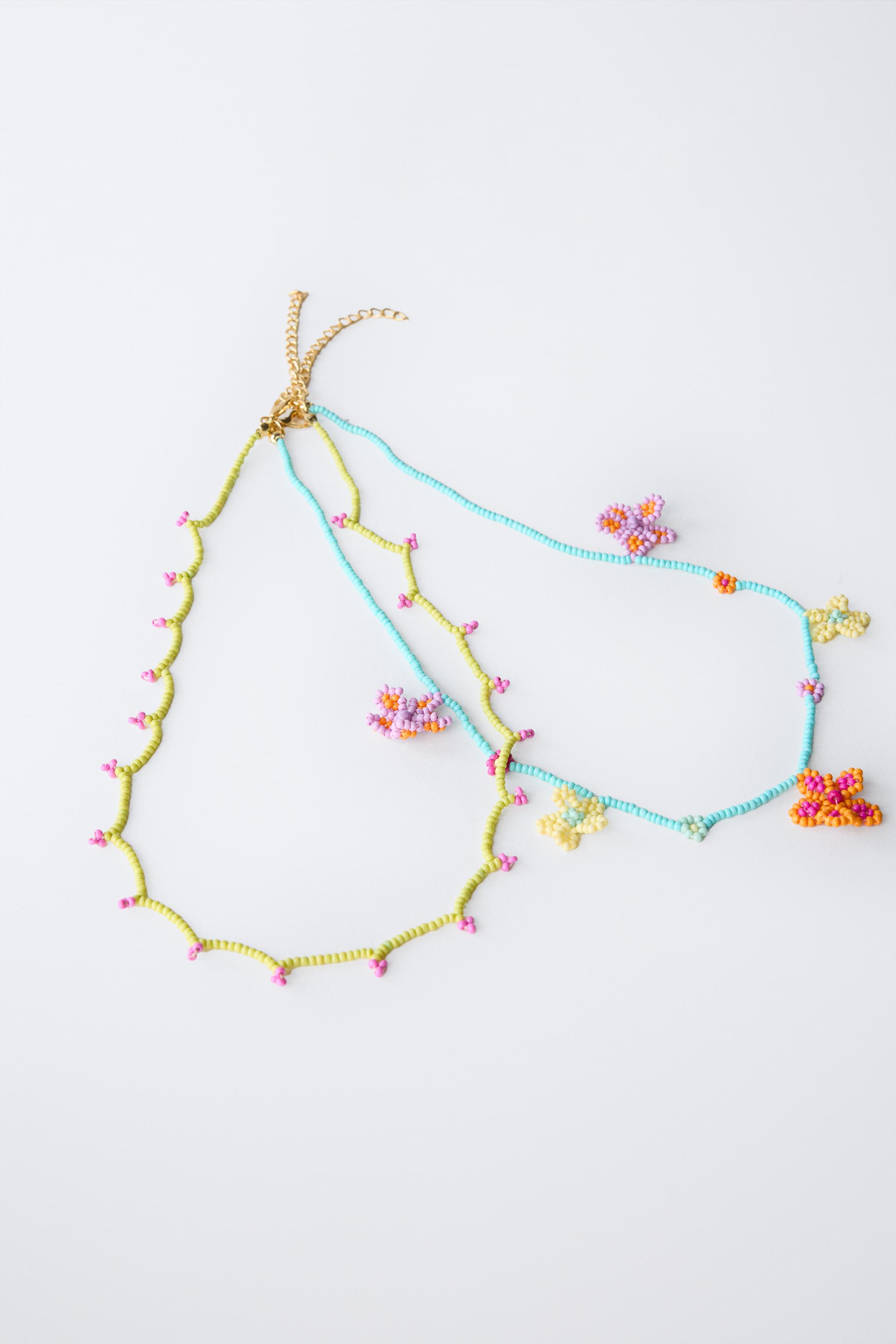 TWO-PACK OF BEADED FLOWER NECKLACES