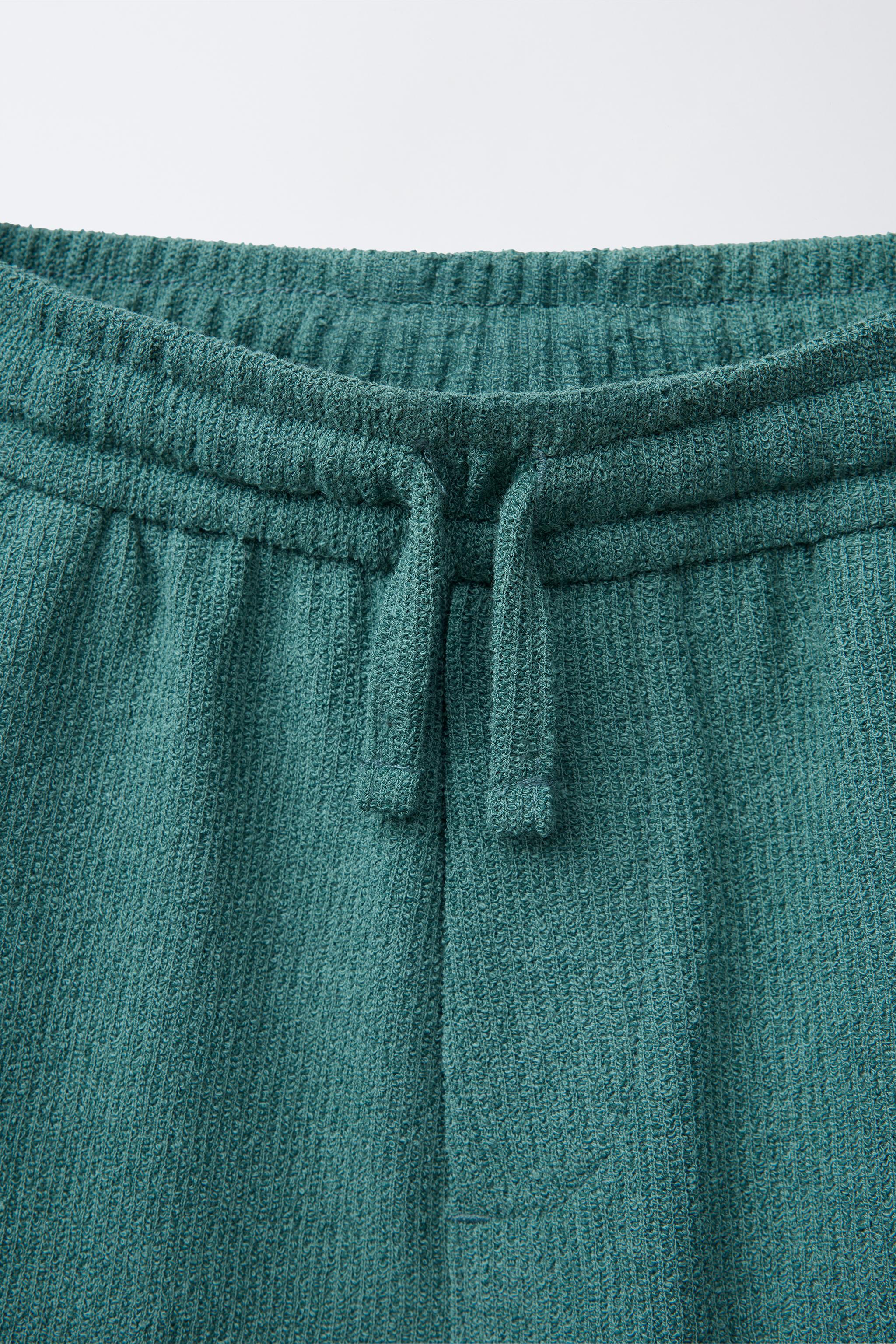 SLIM FIT TEXTURED TOWELING SHORTS